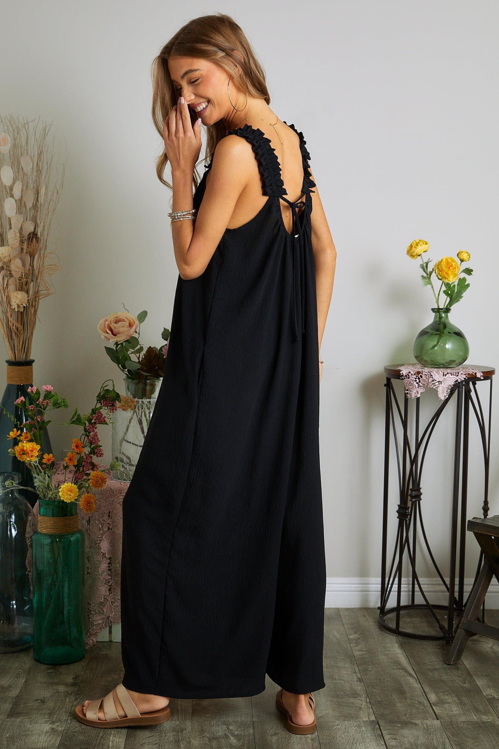 ELASTIC RUFFLE SHOULDER JUMPSUIT Product Image