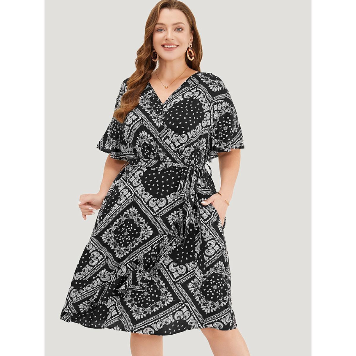 Plus Size Paisley Print Pocket Belted Wrap Flutter Sleeve Dress BlackFlower Women Vacation Wrap V-neck Short sleeve Curvy Knee Dress BloomChic 10/M Product Image