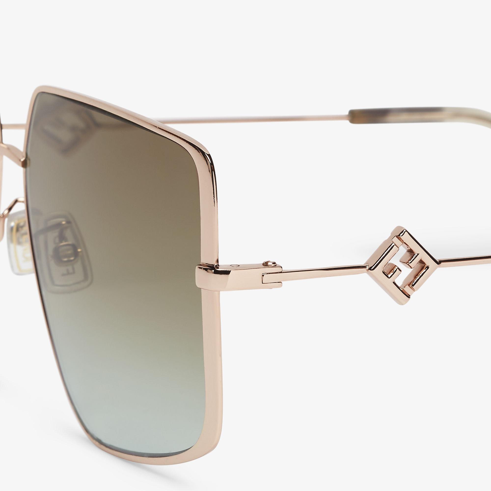FF DiamondsGold-colored metal sunglasses Product Image