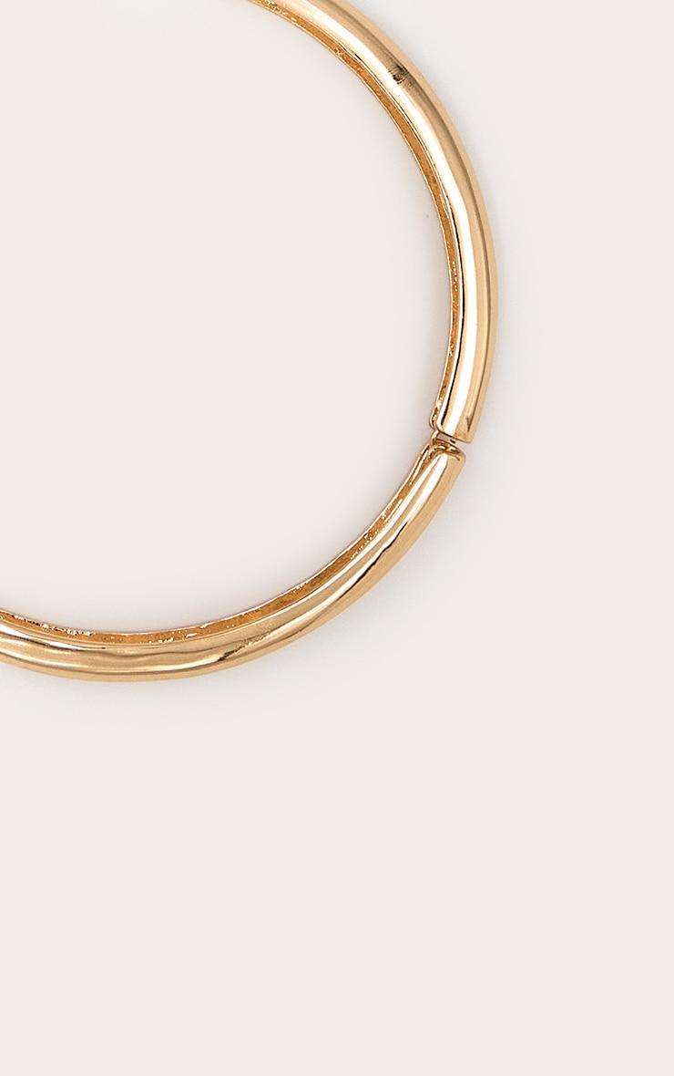 Gold Smooth Twisted Metal Statement Necklace Product Image