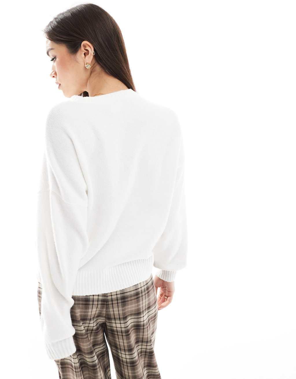 Hollister knitted croissant graphic sweater in cream Product Image