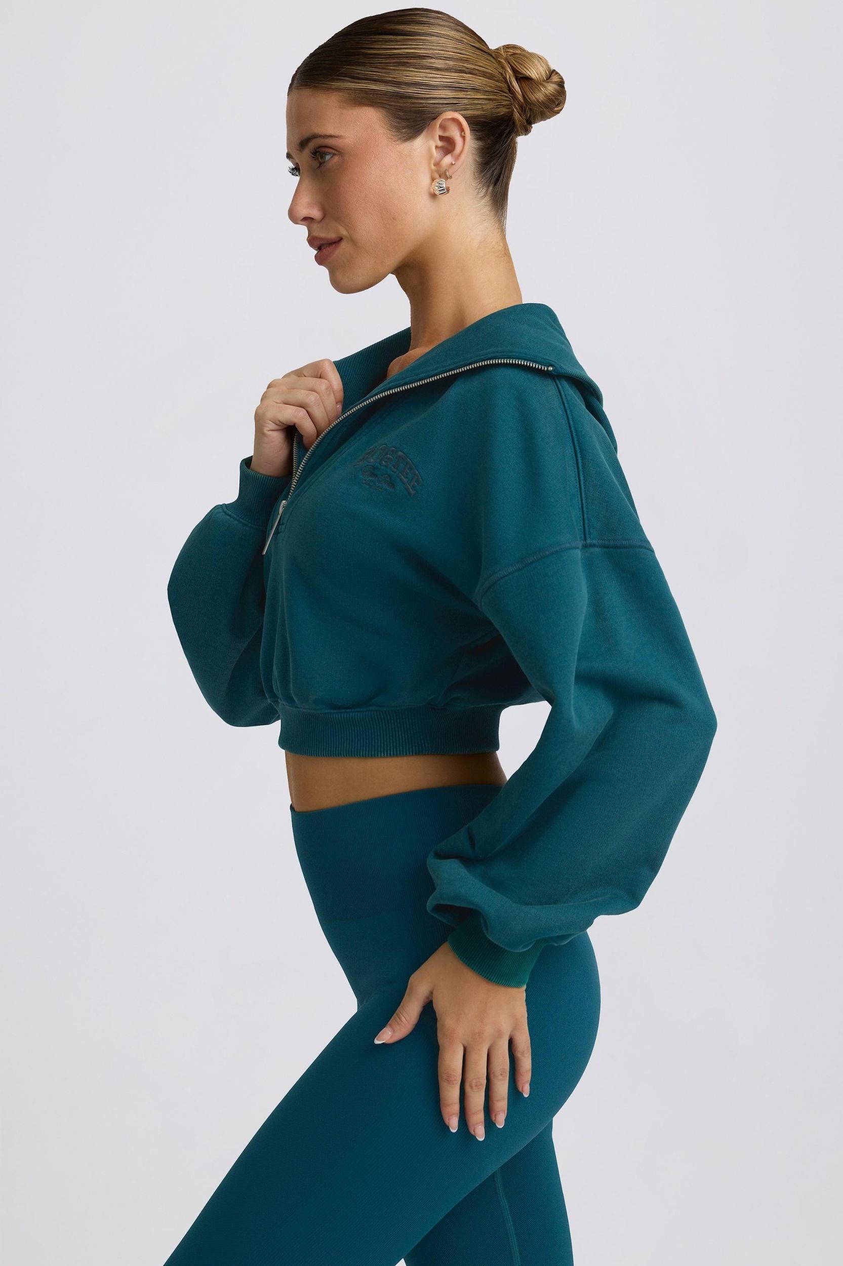 Quarter-Zip Cropped Sweatshirt in Teal Product Image