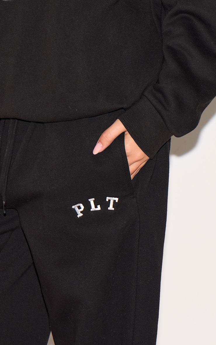 PRETTYLITTLETHING Black Logo Print Oversized Wide Leg Sweatpants Product Image