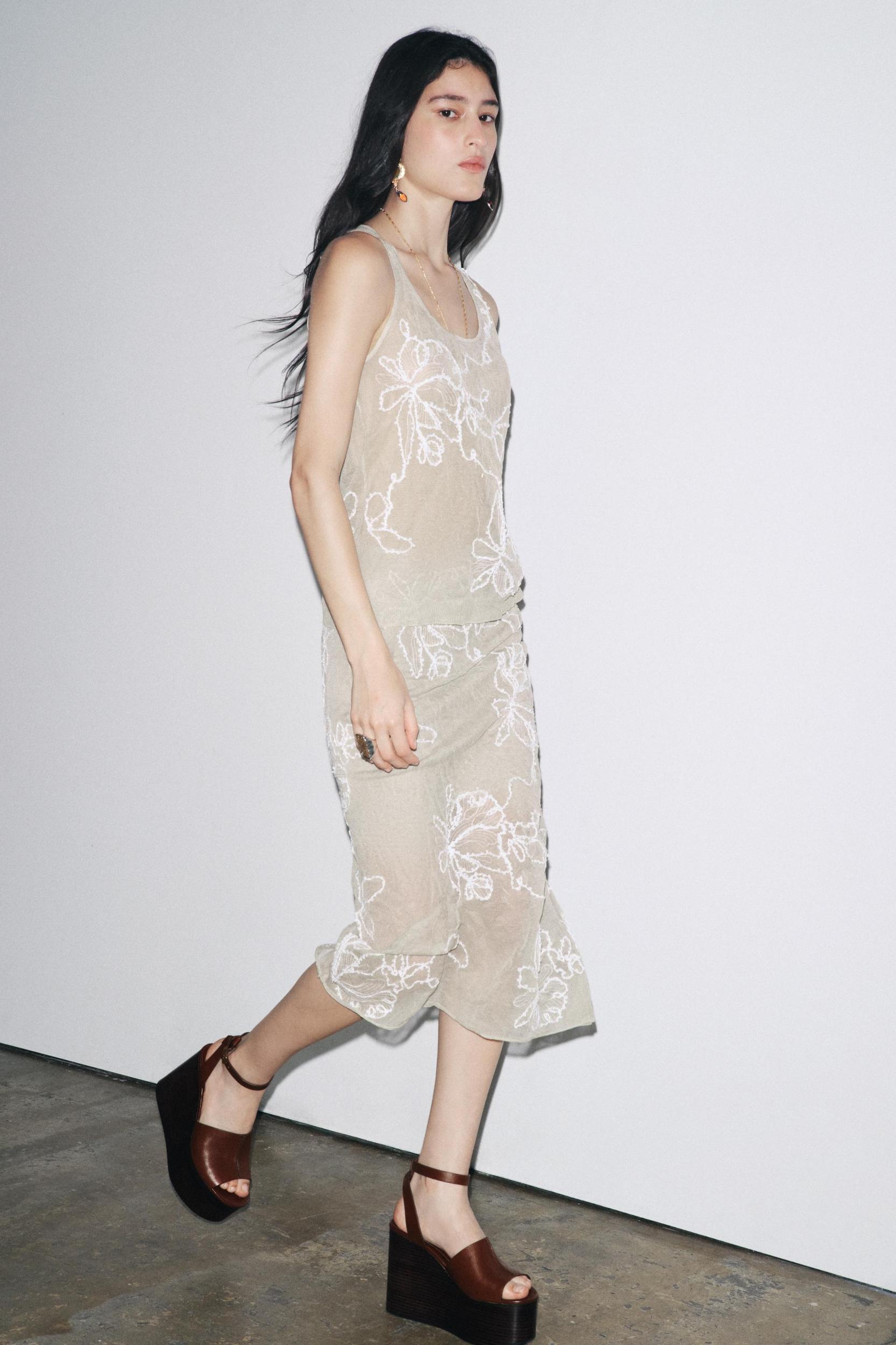 SEMI-SHEER STRUCTURED KNIT TOP Product Image