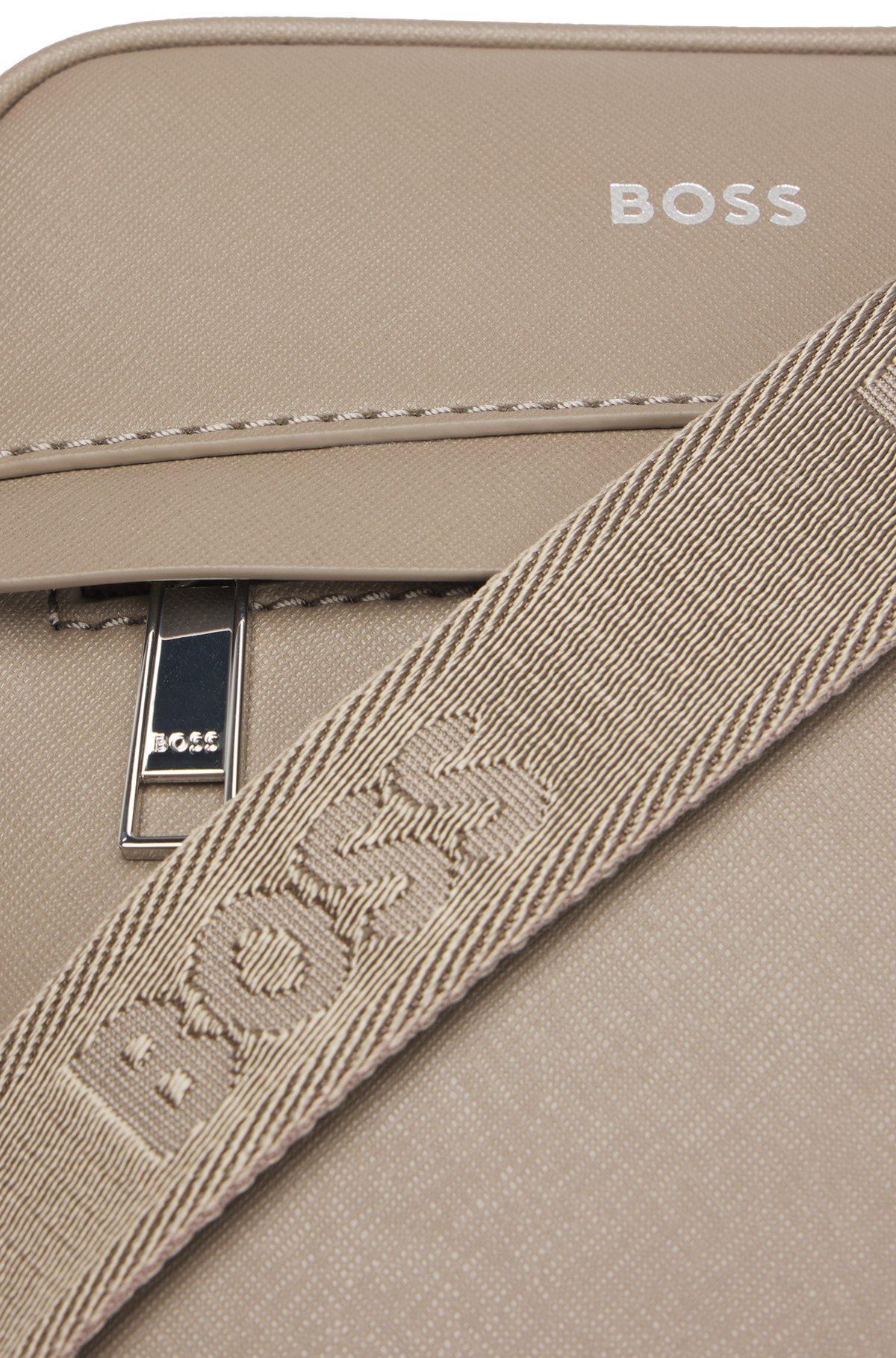 Reporter bag with signature stripe and logo detail Product Image