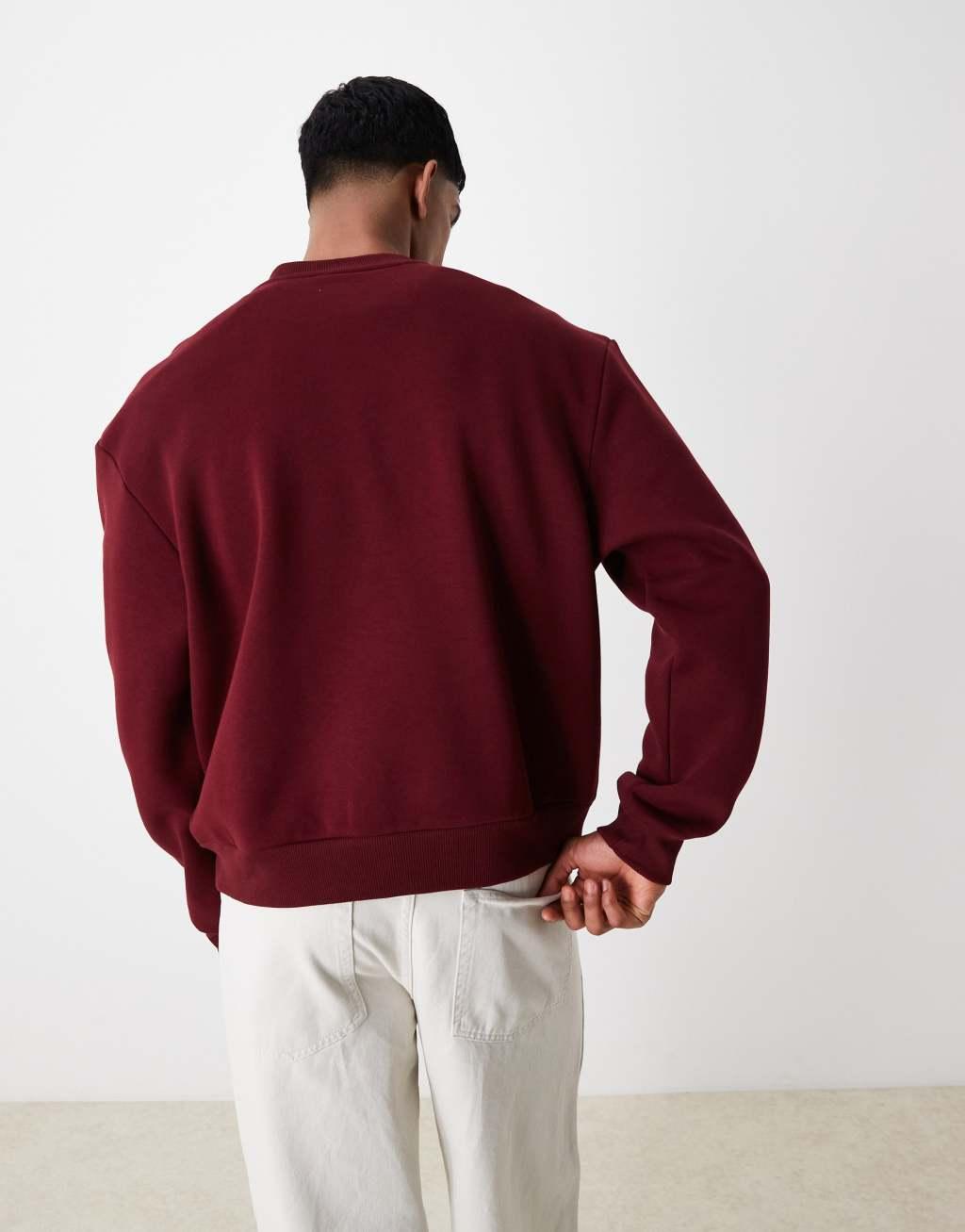 ASOS DESIGN oversized cropped sweatshirt in burgundy with chest print Product Image