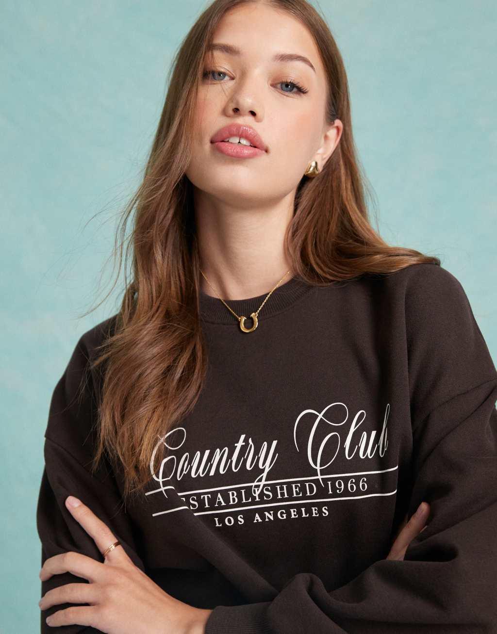 Miss Selfridge Countryclub graphic print sweatshirt in brown Product Image