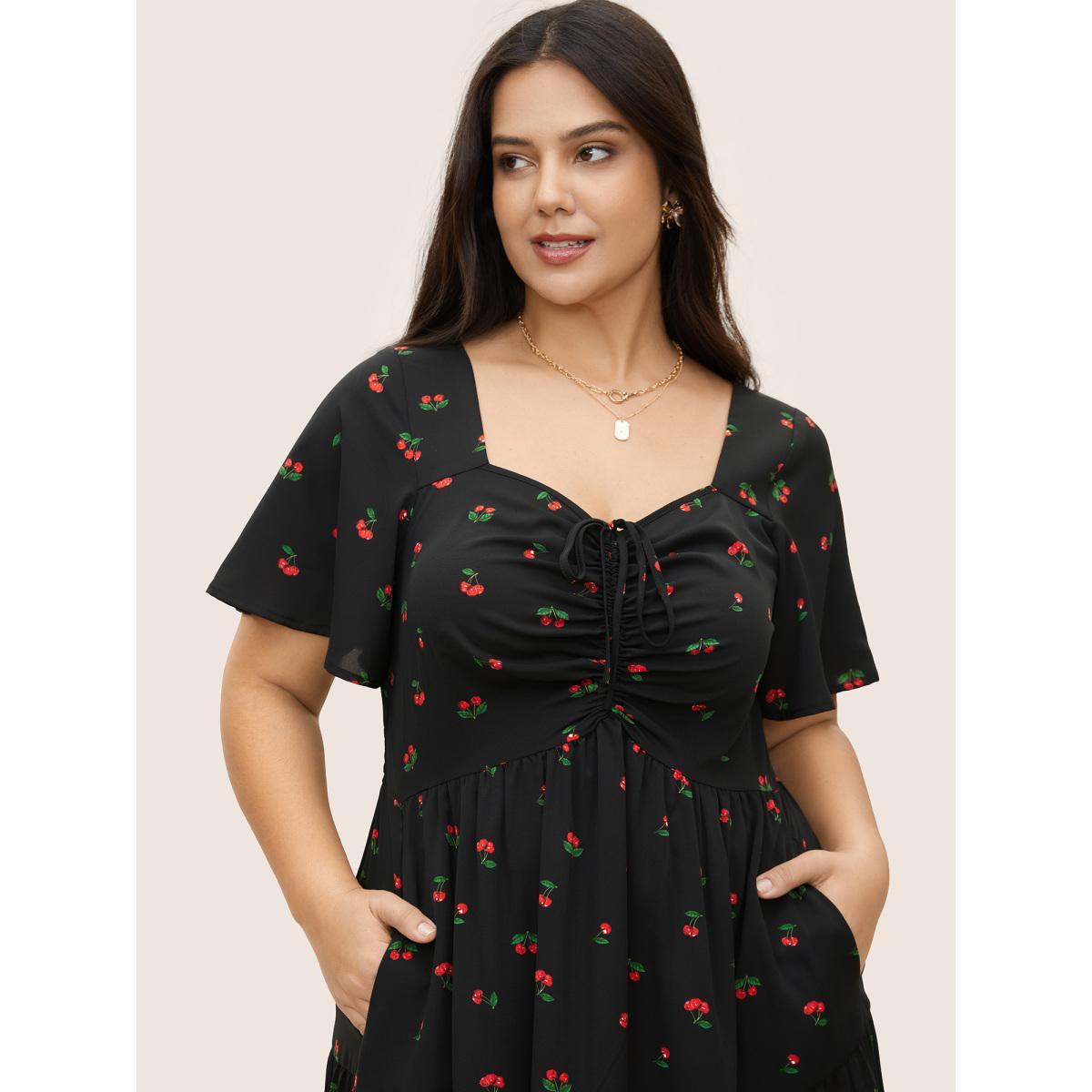 Plus Size Citrus Fruit Print Heart Neckline Drawstring Pleated Dress Black Women Elegant Pleated Heart neckline Short sleeve Curvy Midi Dress BloomChic 12/L Product Image