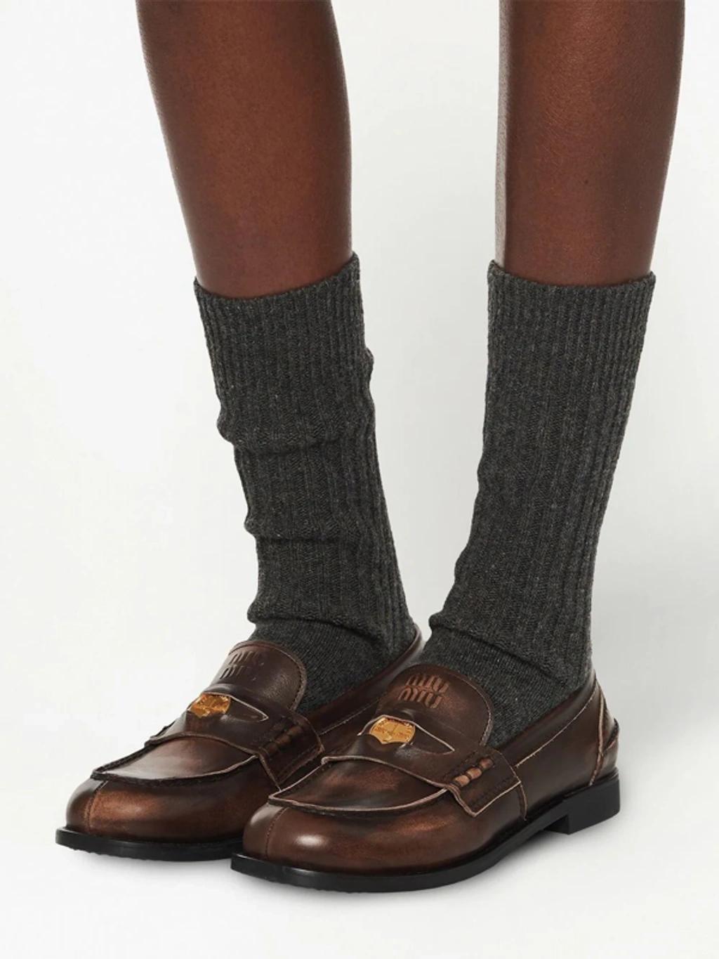 MIU MIU Leather Distressed Penny Loafers In Brown Product Image