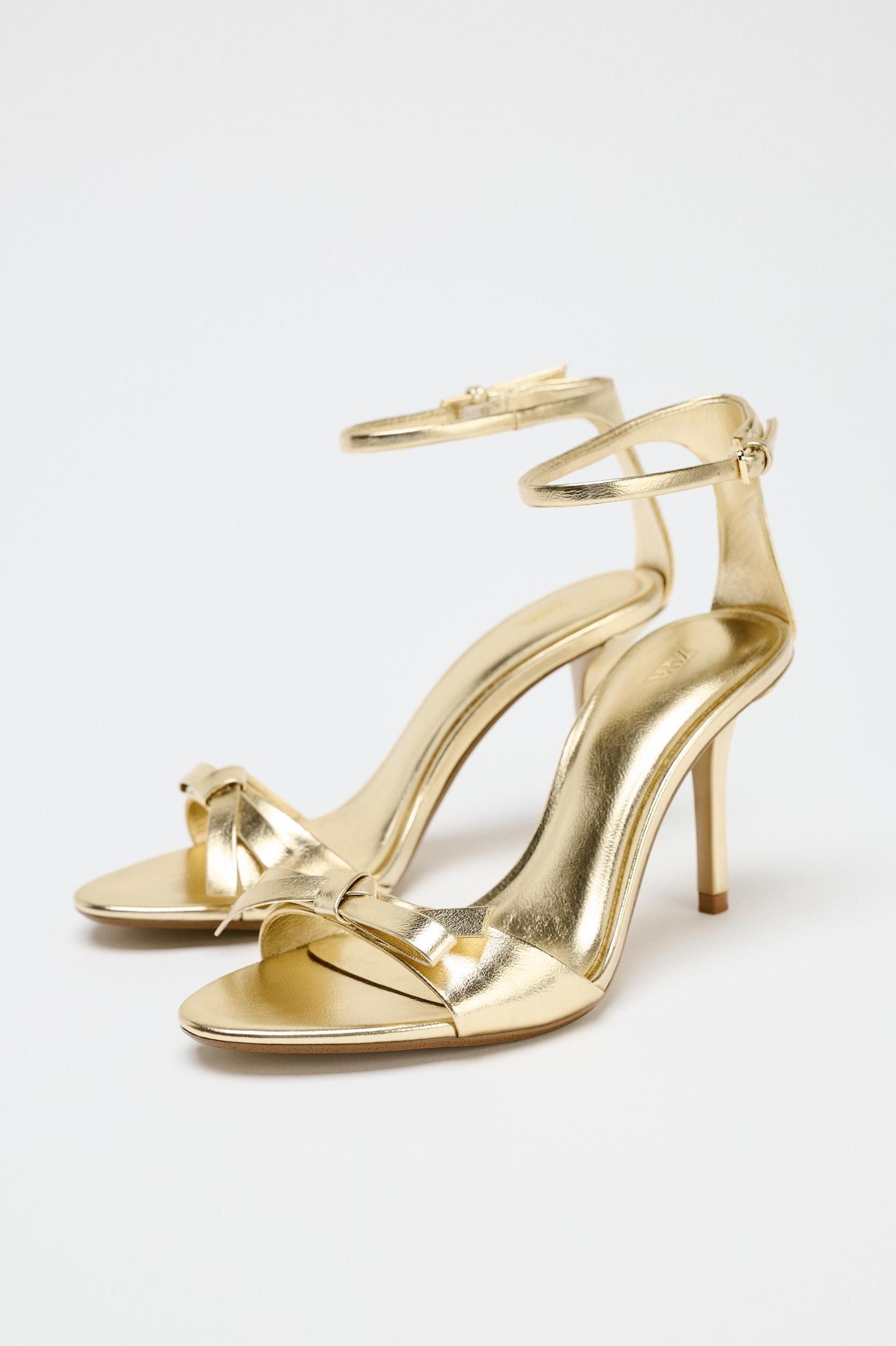 METALLIC EFFECT BOW HEELED SANDALS Product Image