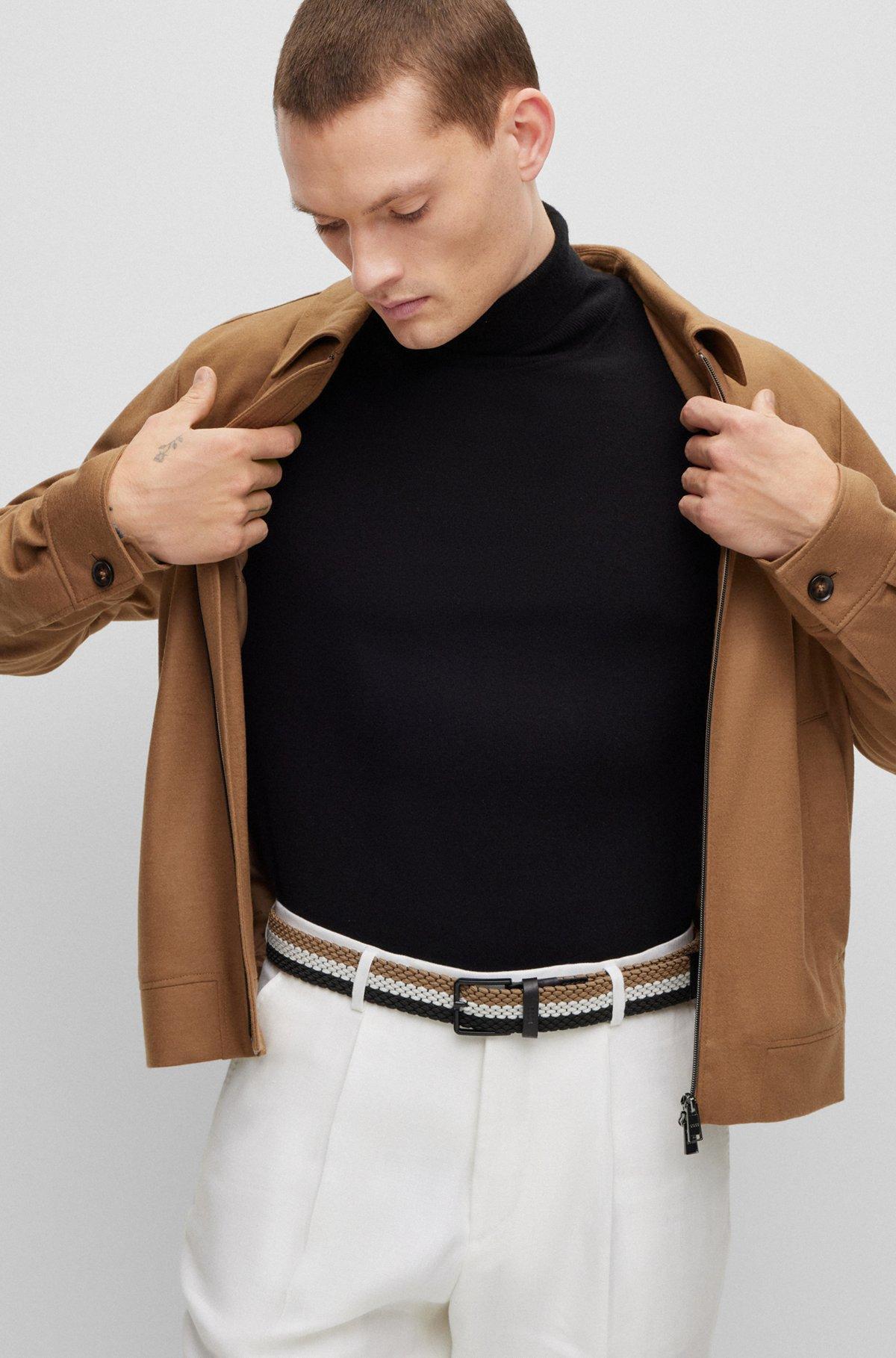 Woven belt with leather trims and contrasting color detail Product Image