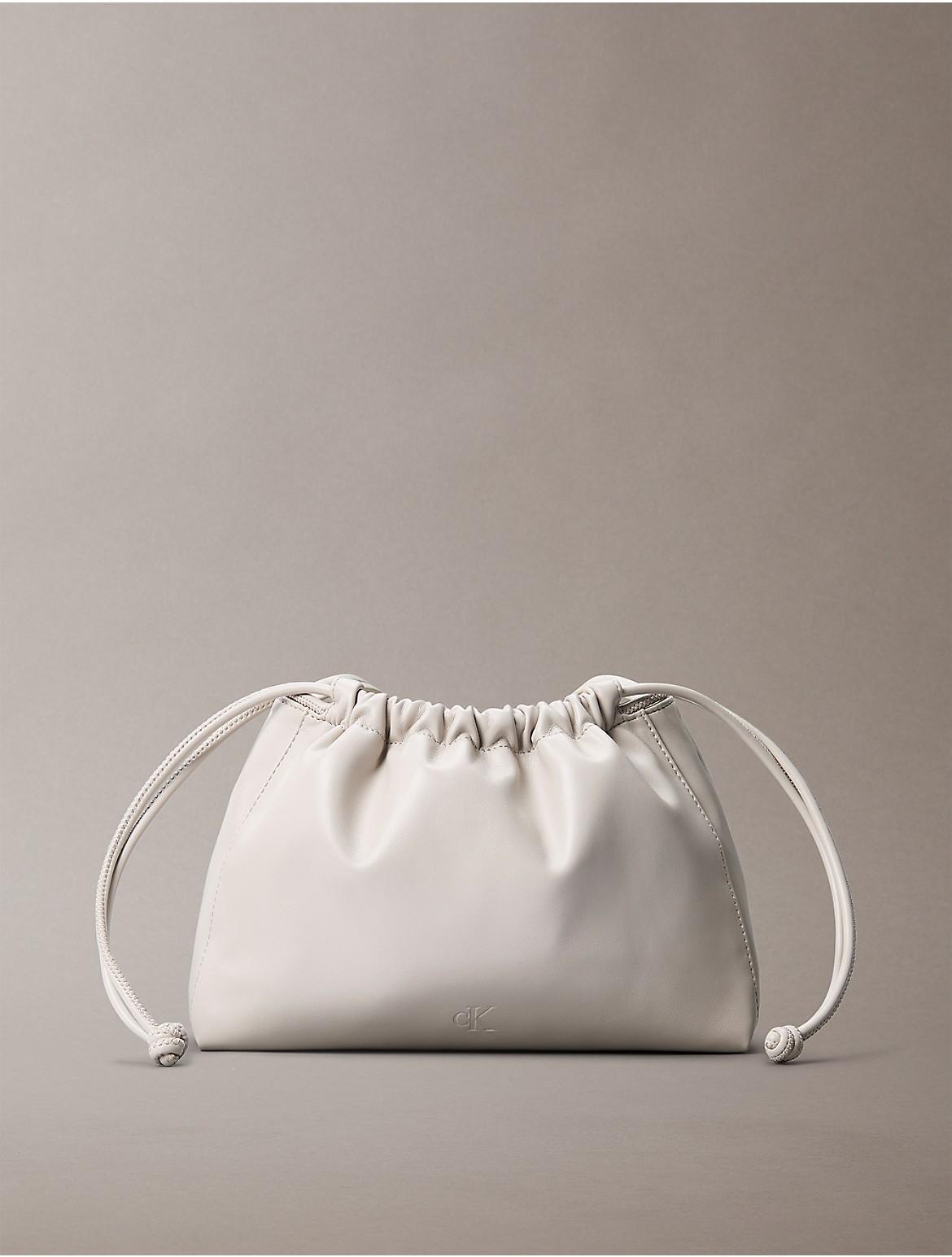 Calvin Klein Women's Drawstring Crossbody Bag - Pink Product Image