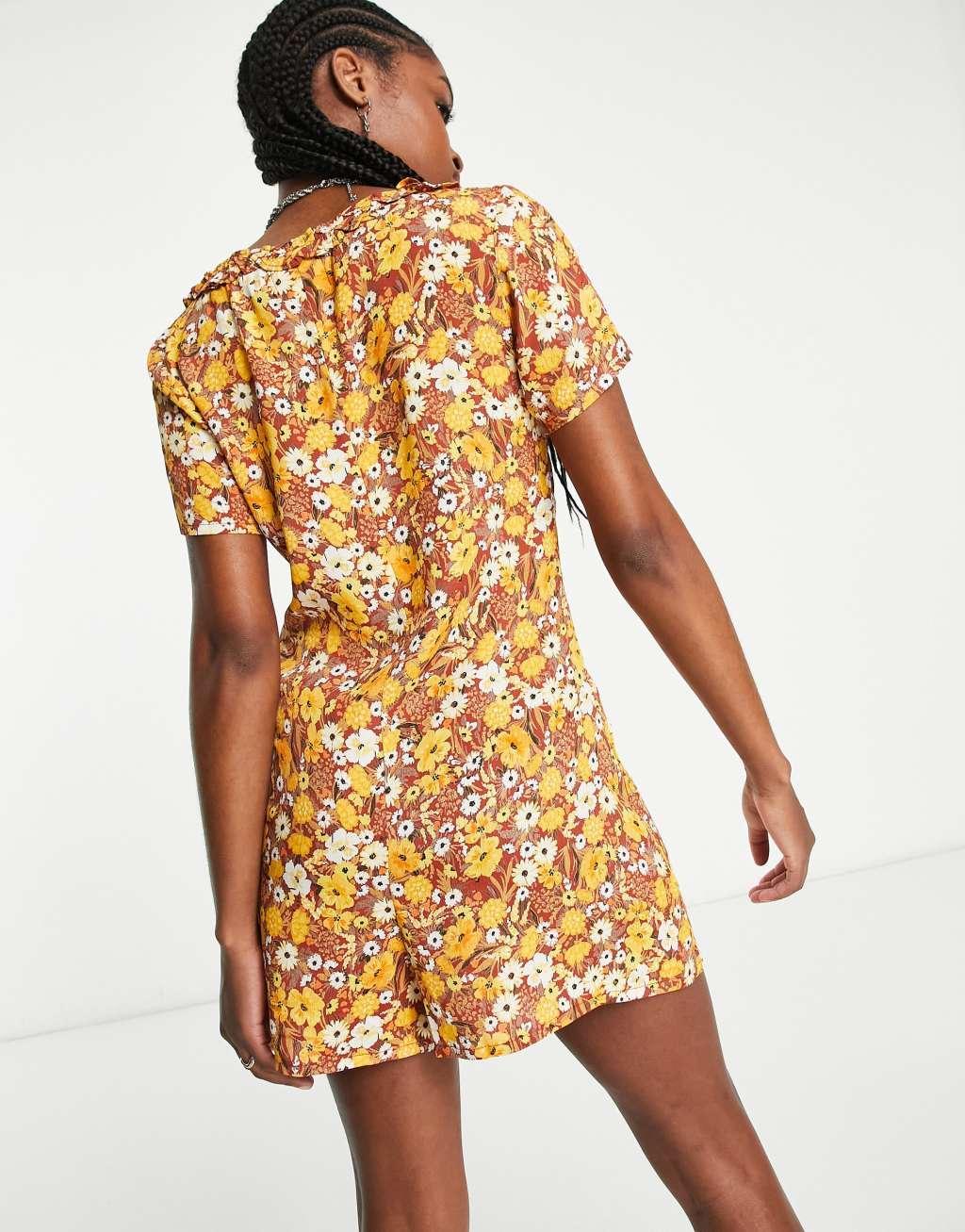 Reclaimed Vintage short sleeve romper with ruffle trim in vintage brown floral Product Image