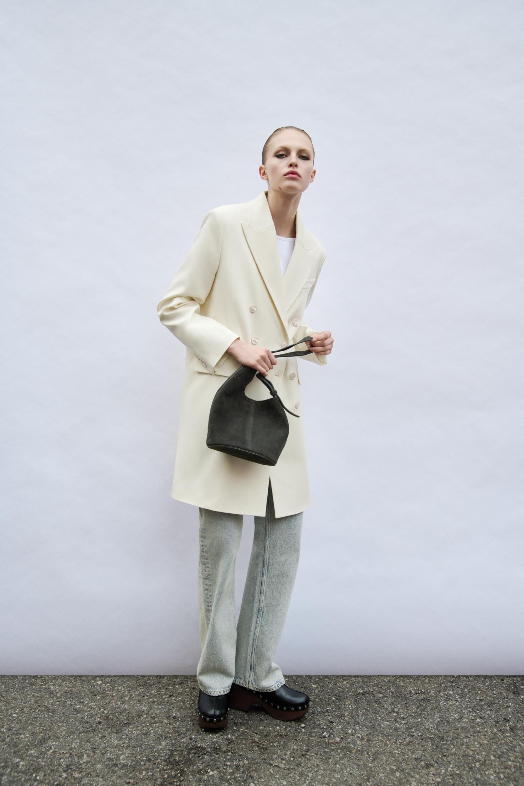 ASYMMETRIC SOFT SUEDE MINI BUCKET BAG Product Image