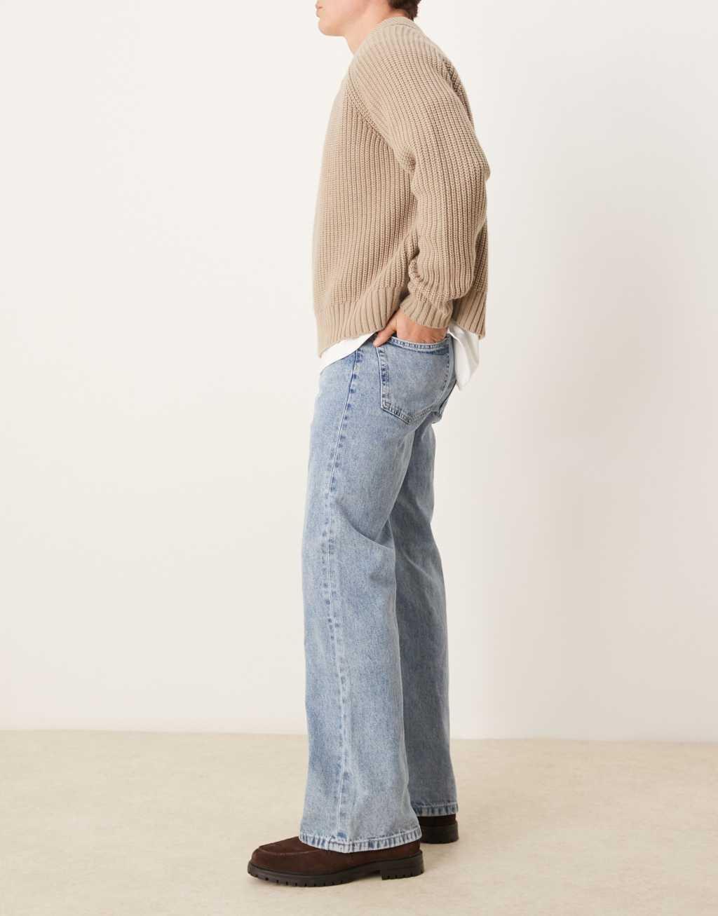ASOS DESIGN wide flare jeans in light wash blue Product Image