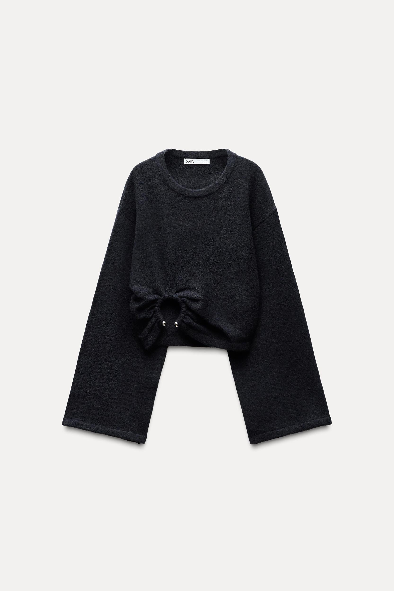 KNIT SWEATER WITH METALLIC APPLIQUÉ Product Image