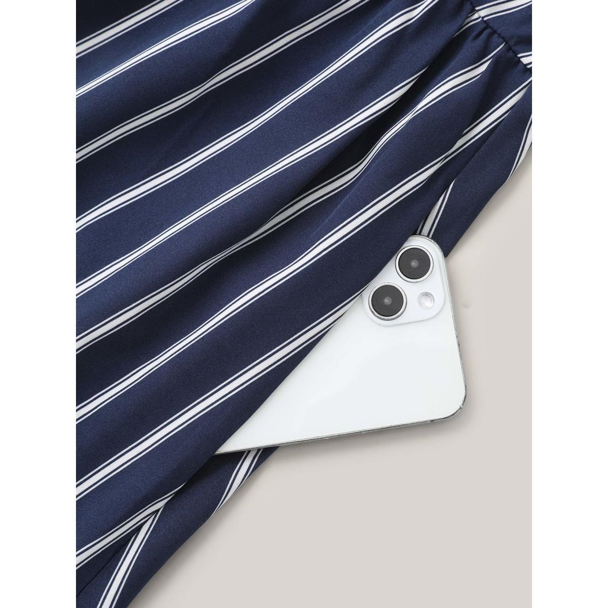Plus Size Striped Stretchy Waist Defining Pockets Dress Indigo Women At the Office Pleated Round Neck Short sleeve Curvy BloomChic 12/L Product Image
