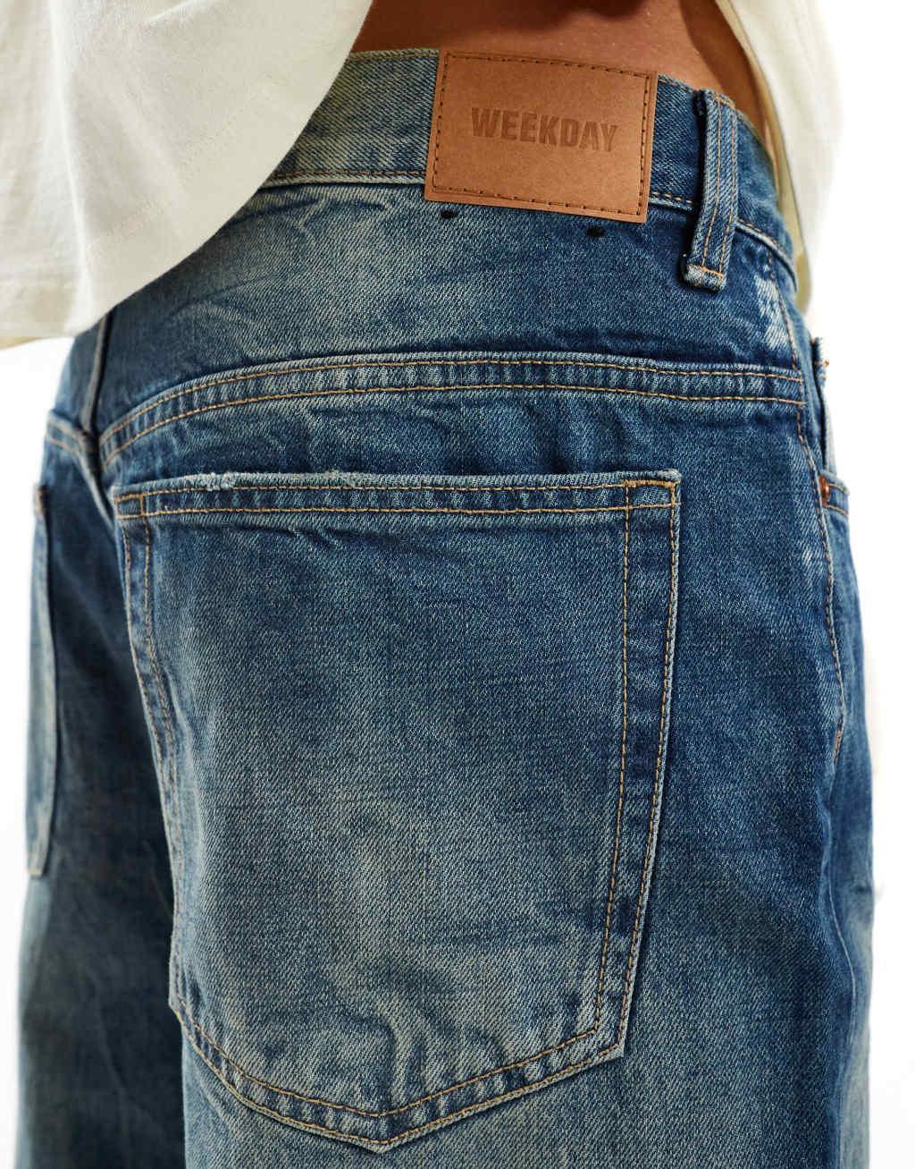 Weekday Sphere low waist loose fit jeans in blue streaky wash Product Image