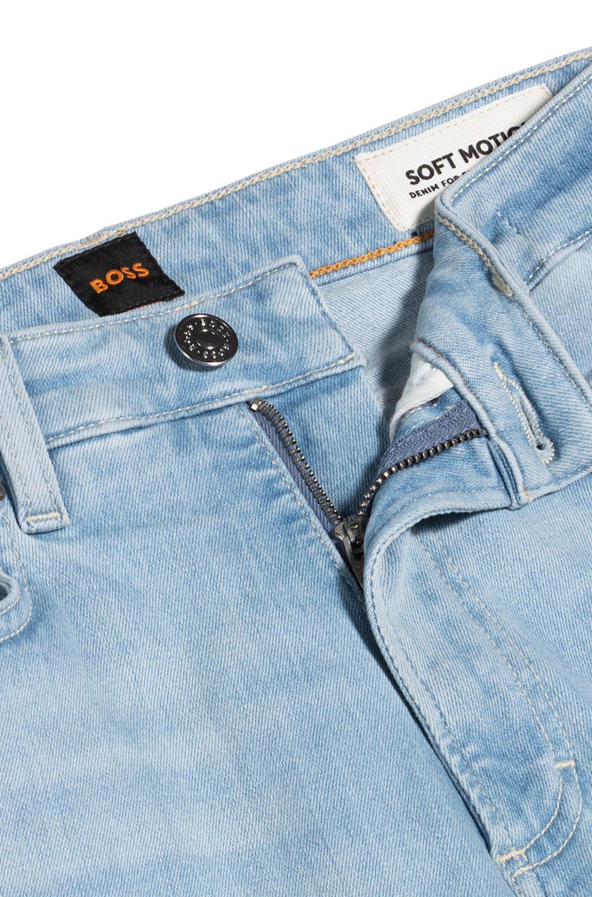 Bootcut jeans in blue stretch denim with slit hems Product Image