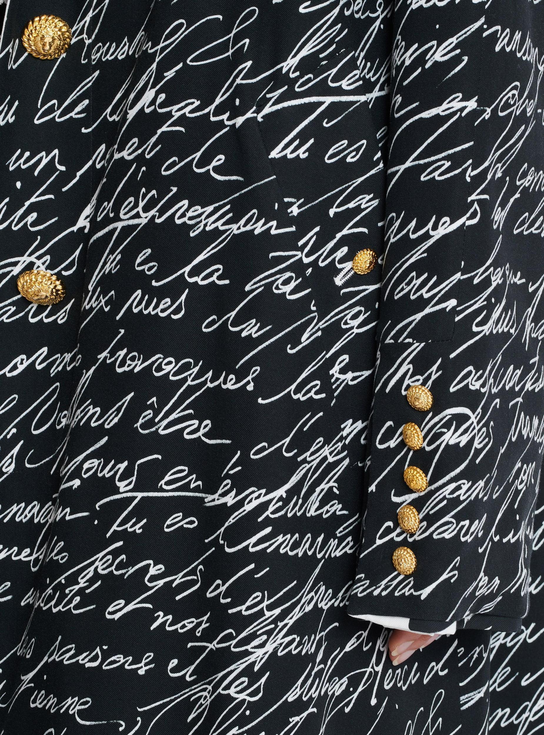 Long reversible coat with "Love Letter" print Product Image