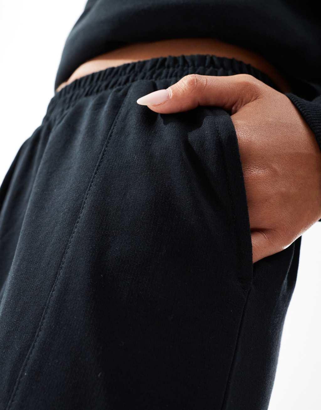 ASOS DESIGN straight leg sweatpants in black Product Image
