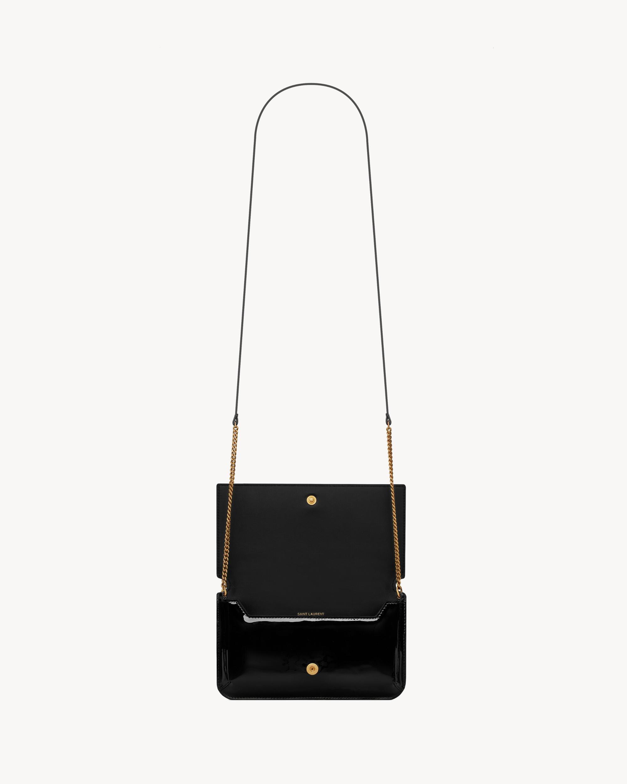 CASSANDRE phone holder IN PATENT LEATHER Product Image