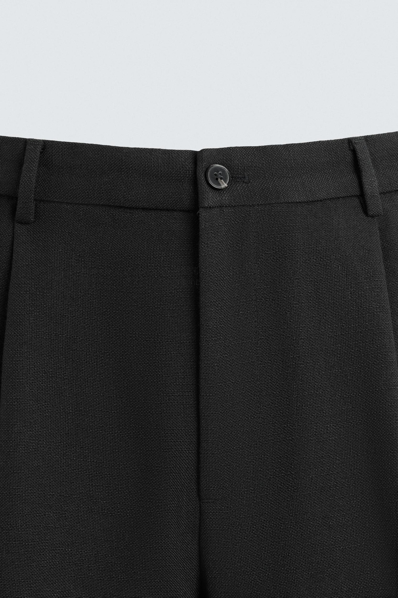 PLEATED RELAXED FIT PANTS Product Image