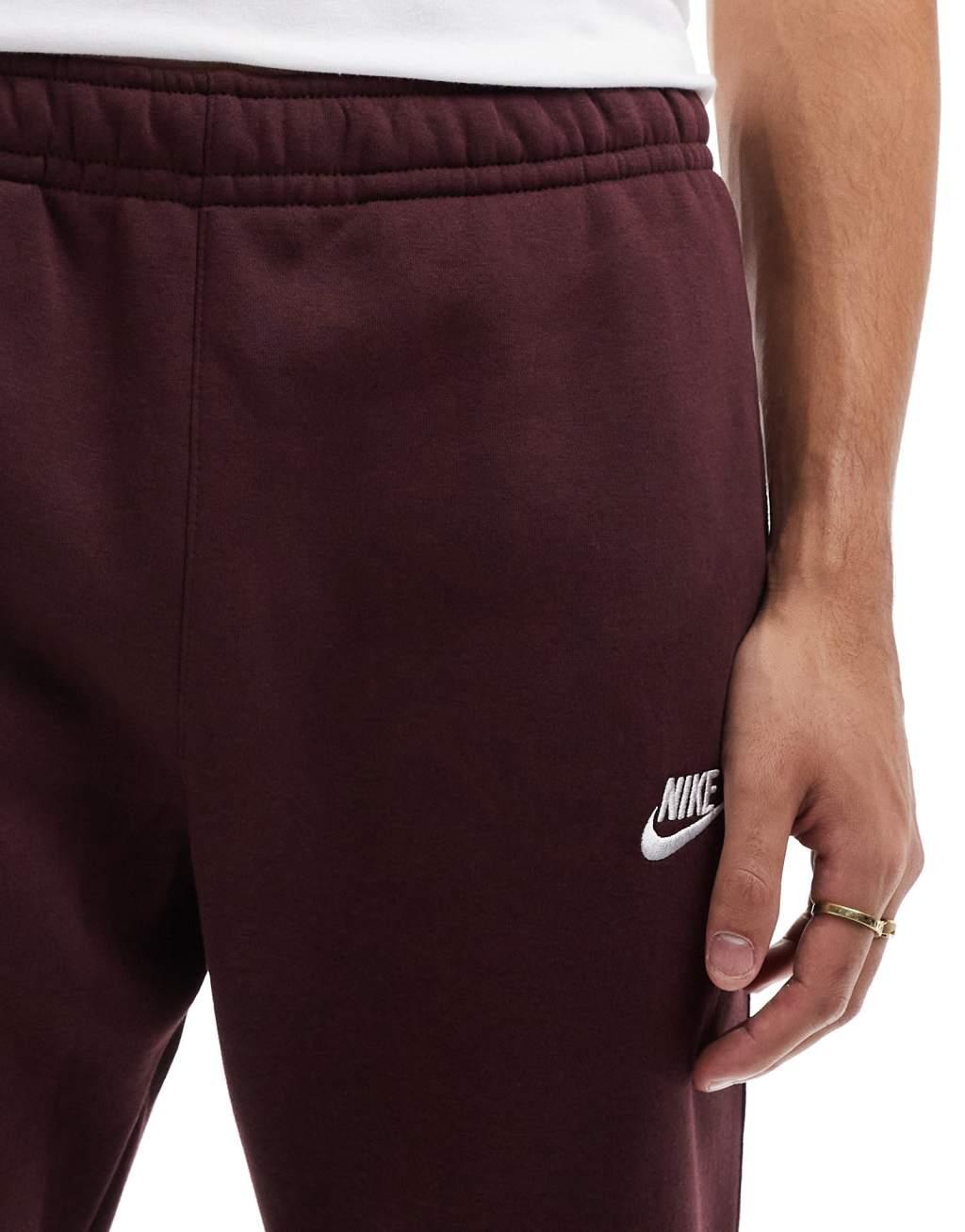 Nike Club cuffed joggers in burgundy Product Image