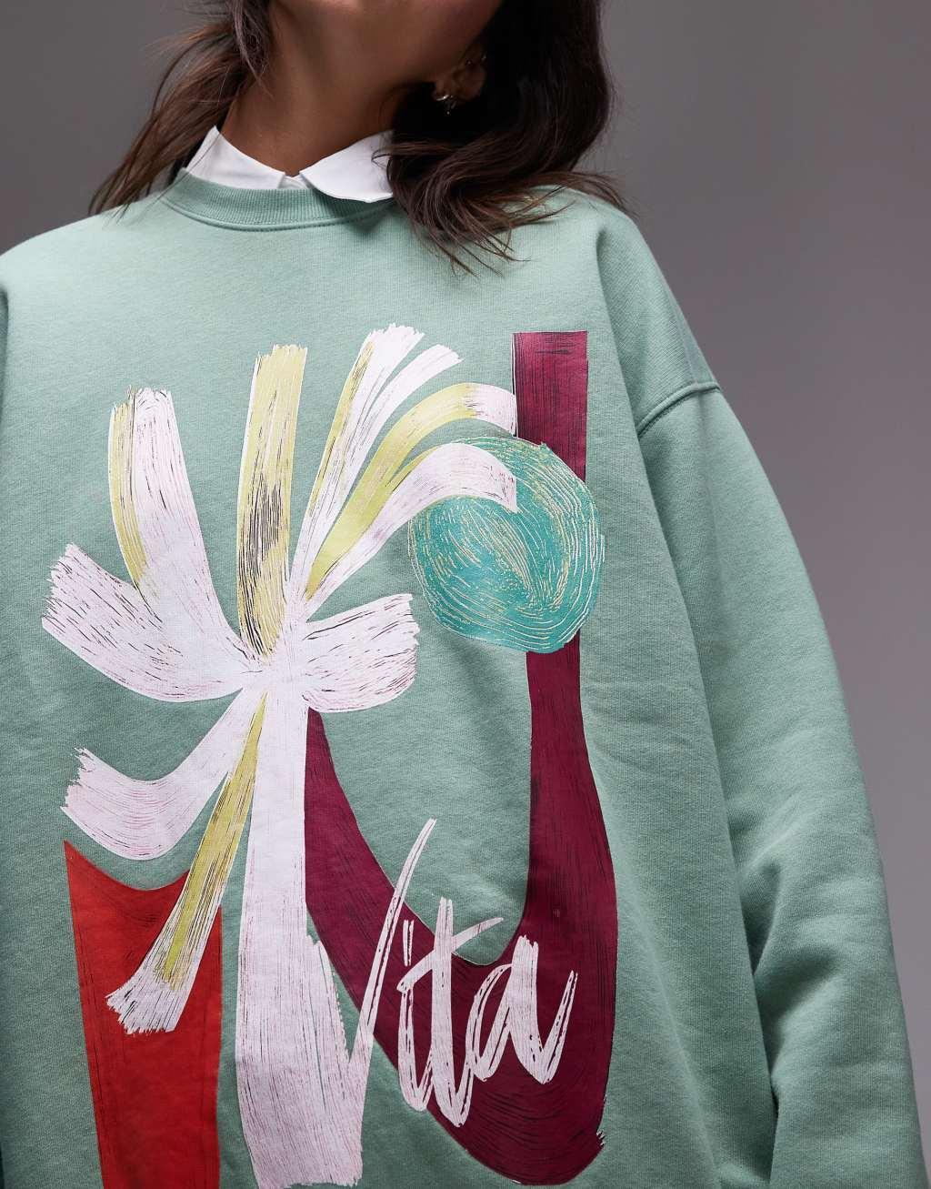 Topshop oversized washed sweatshirt with abstract graphic in green Product Image