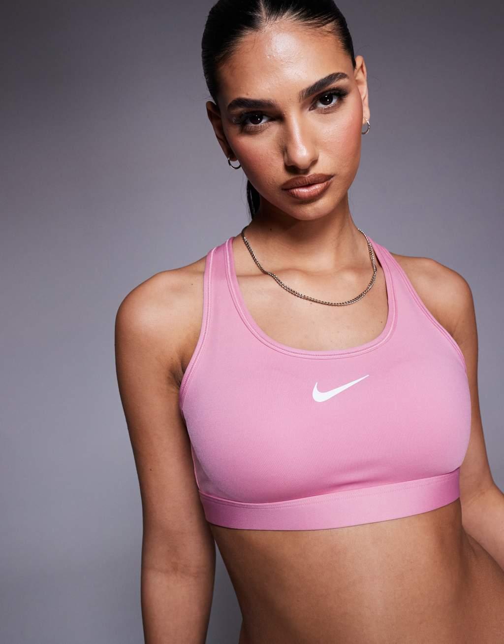 Nike Training swoosh medium support sports bra in pink Product Image