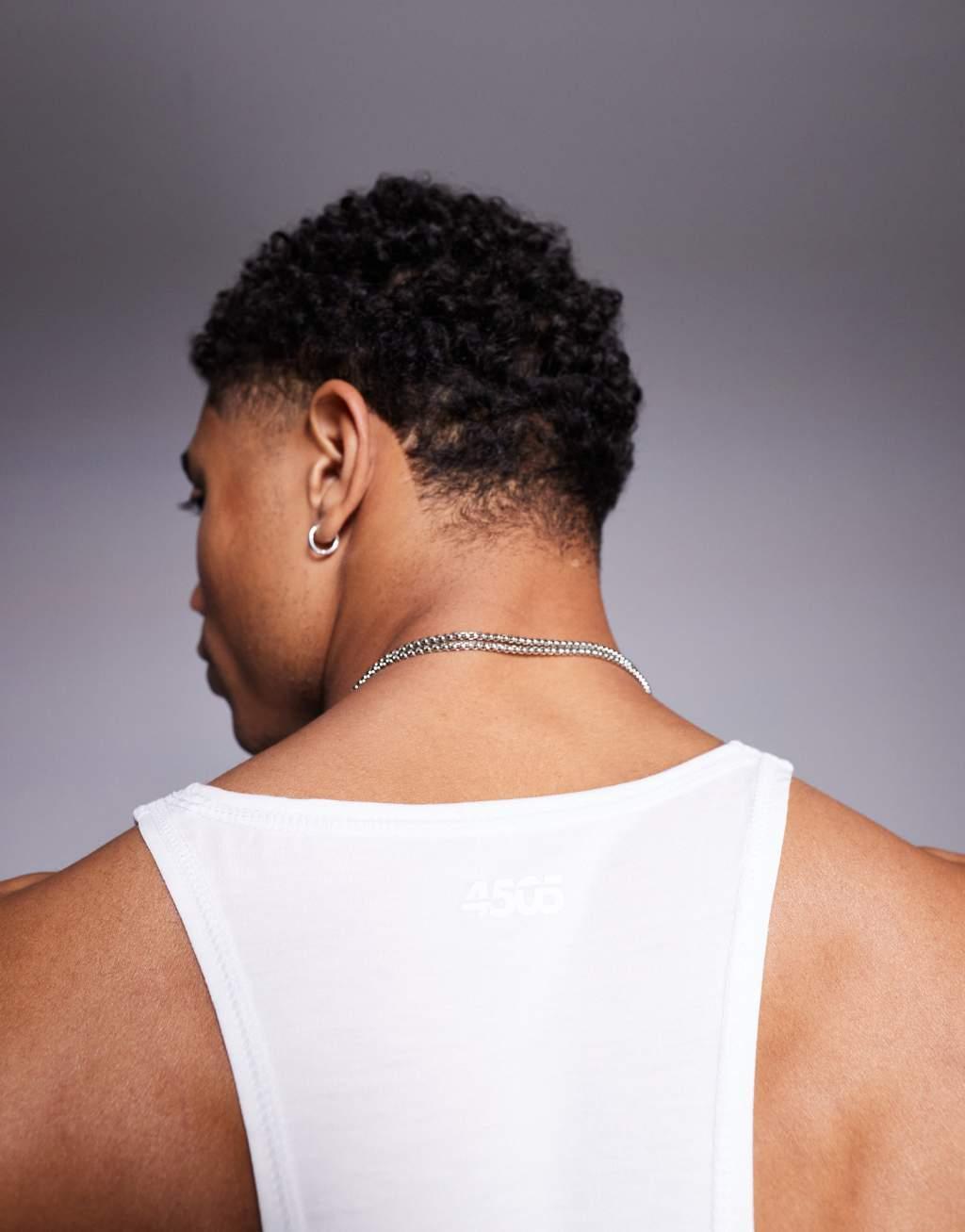 4505 Icon performance jersey quick dry stringer tank top in white Product Image
