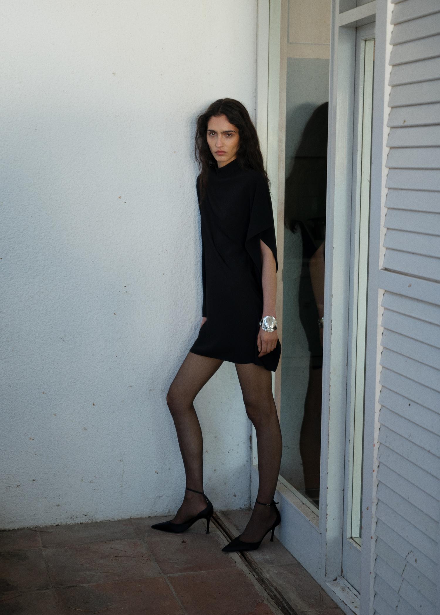 Short asymmetrical sleeve dress - Women | MANGO USA Product Image
