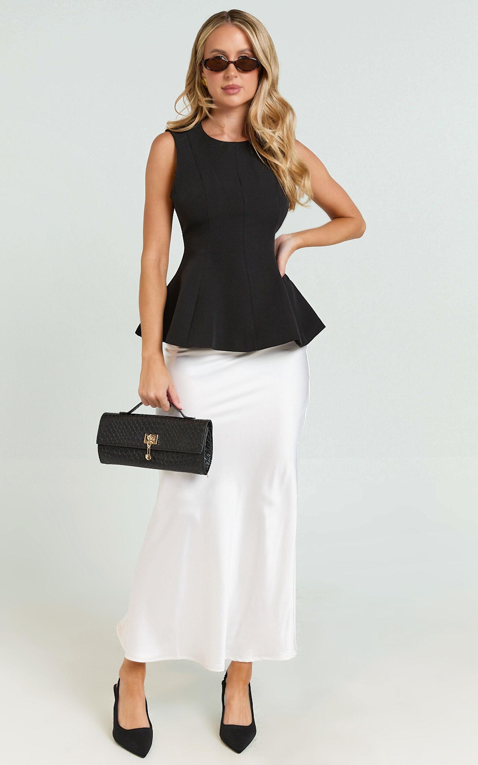 Gera Top - Structured Peplum Top in Black Product Image