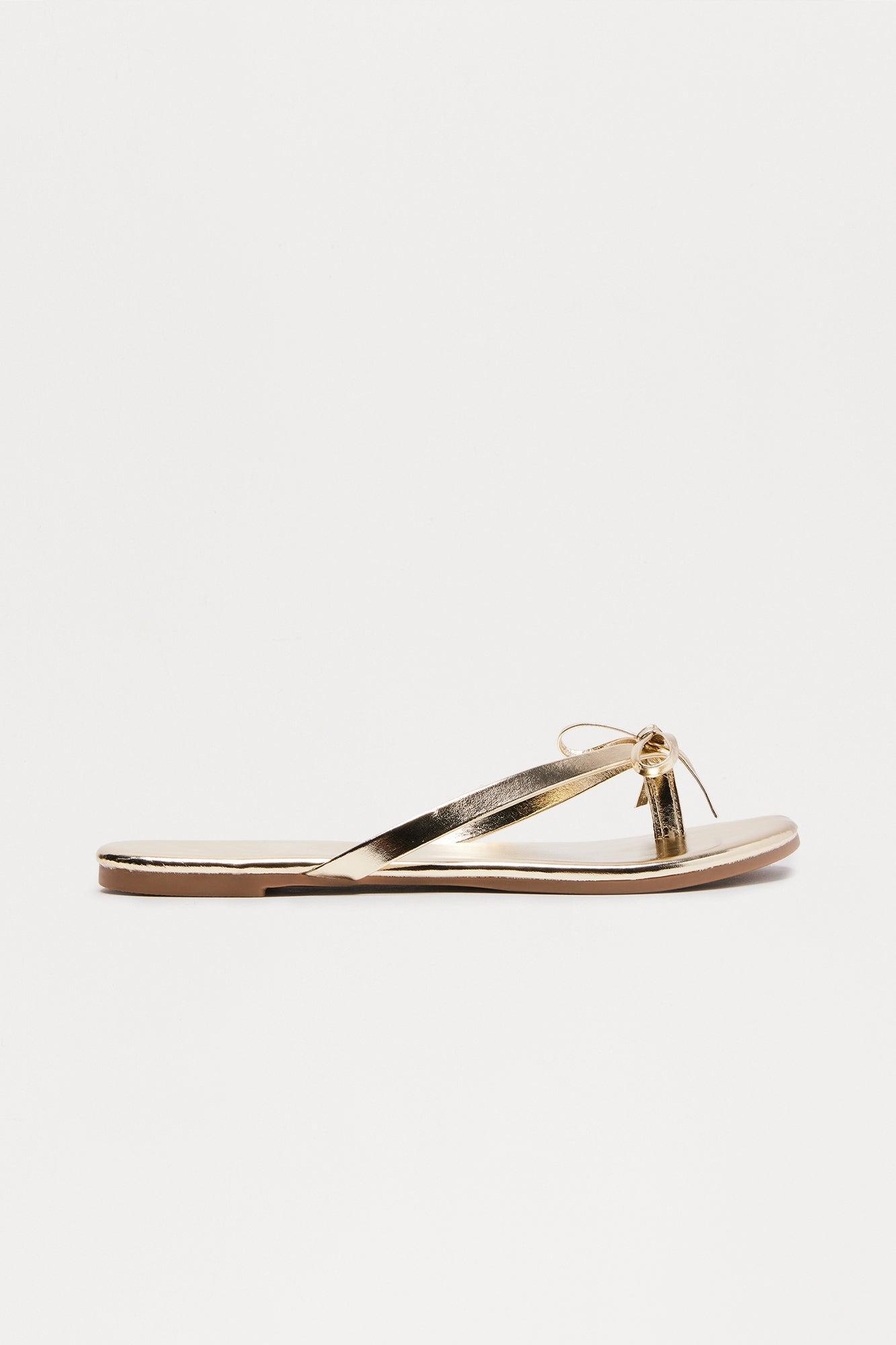 Coral Bow Flip Flops - Gold Product Image