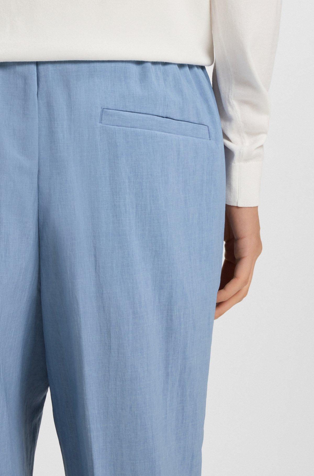 Slim-fit trousers in melange wrinkle-resistant fabric Product Image