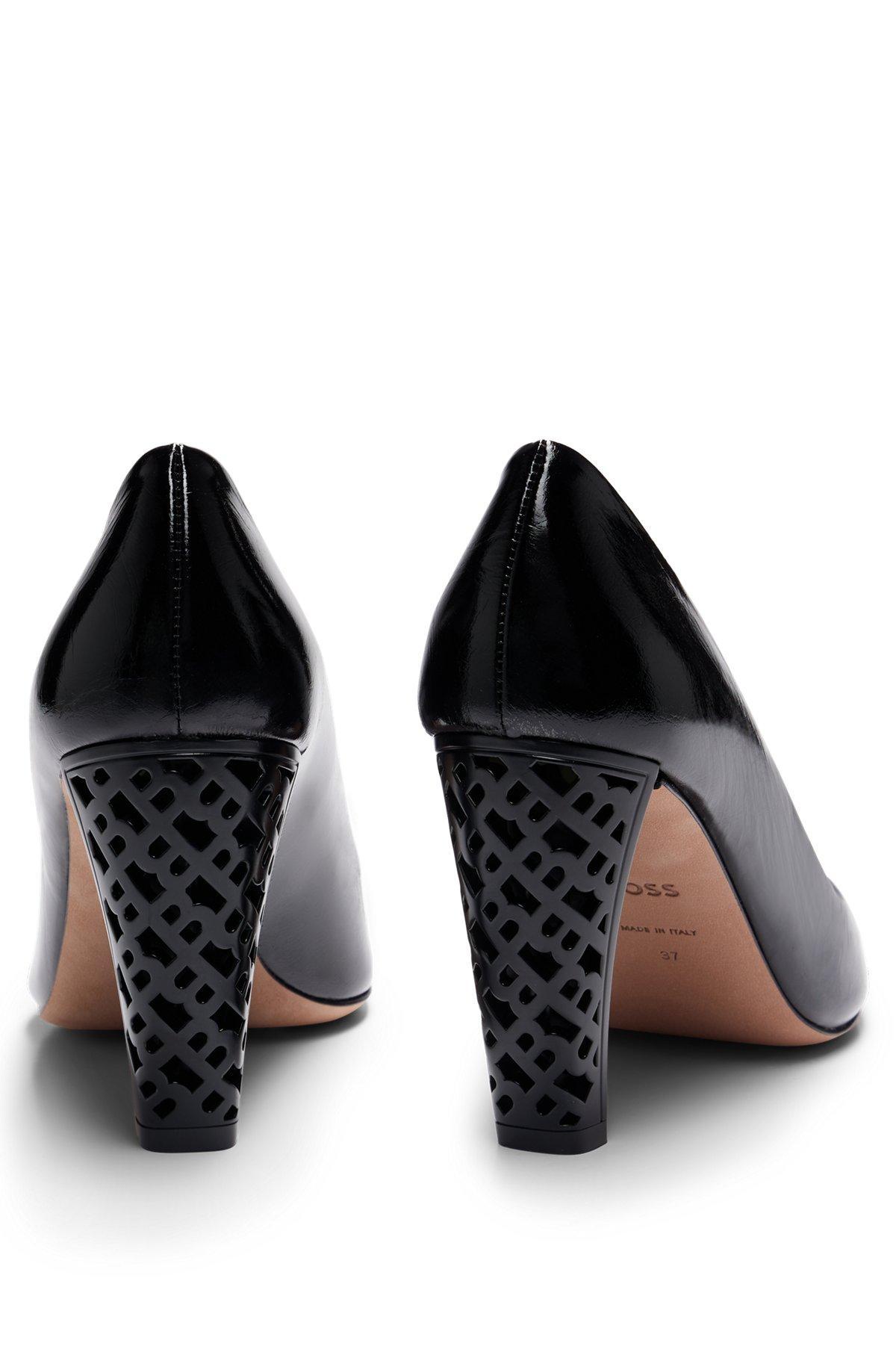 Leather pumps with monogram-patterned heels Product Image