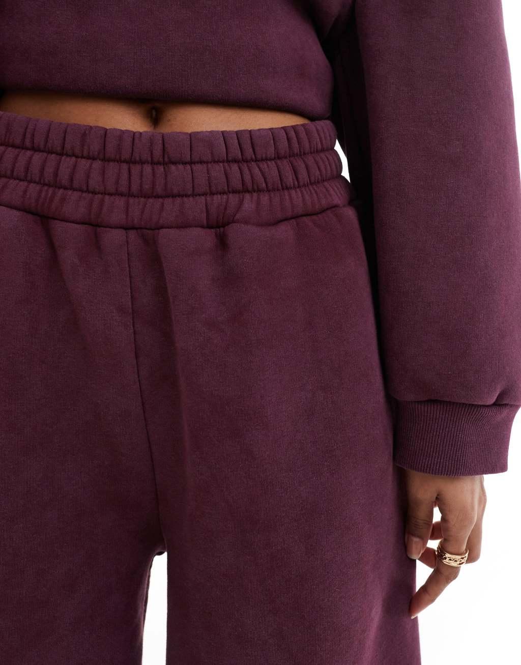 ASOS DESIGN cocoon leg sweatpants in acid wash burgundy - part of a set Product Image