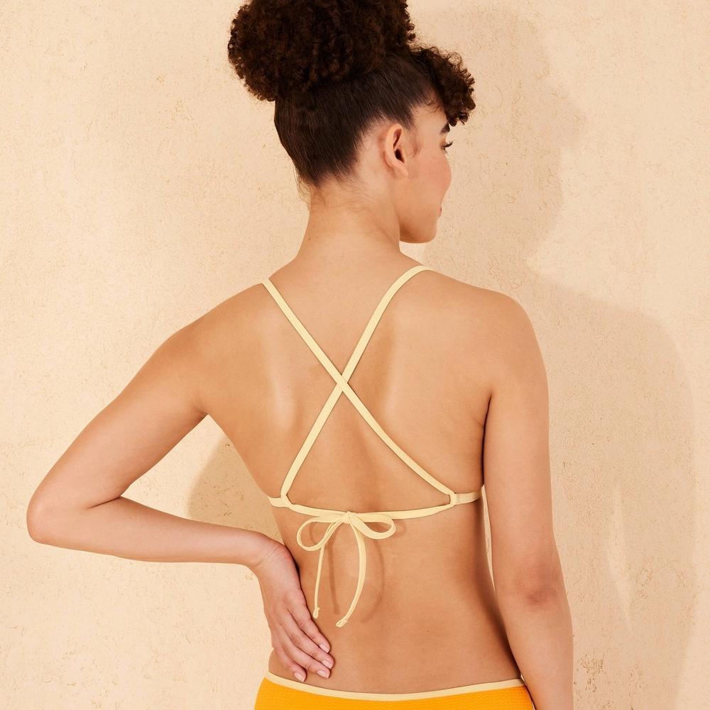 Women's Pucker Textured Contrast Binding Triangle Bikini Top - Wild Fable™ Orange/Yellow M: Crisscross Back, Adjustable Straps Product Image
