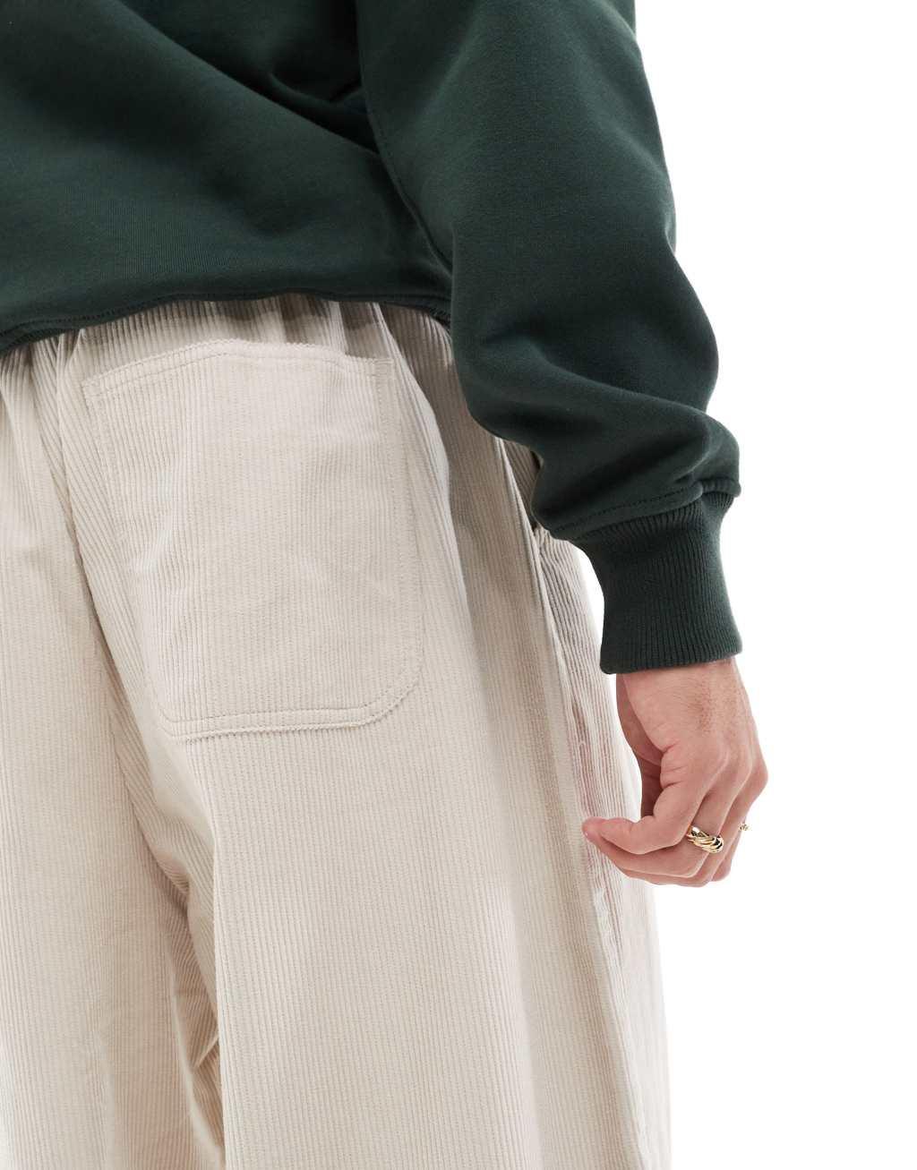ASOS DESIGN baggy parachute cord pants in cream Product Image