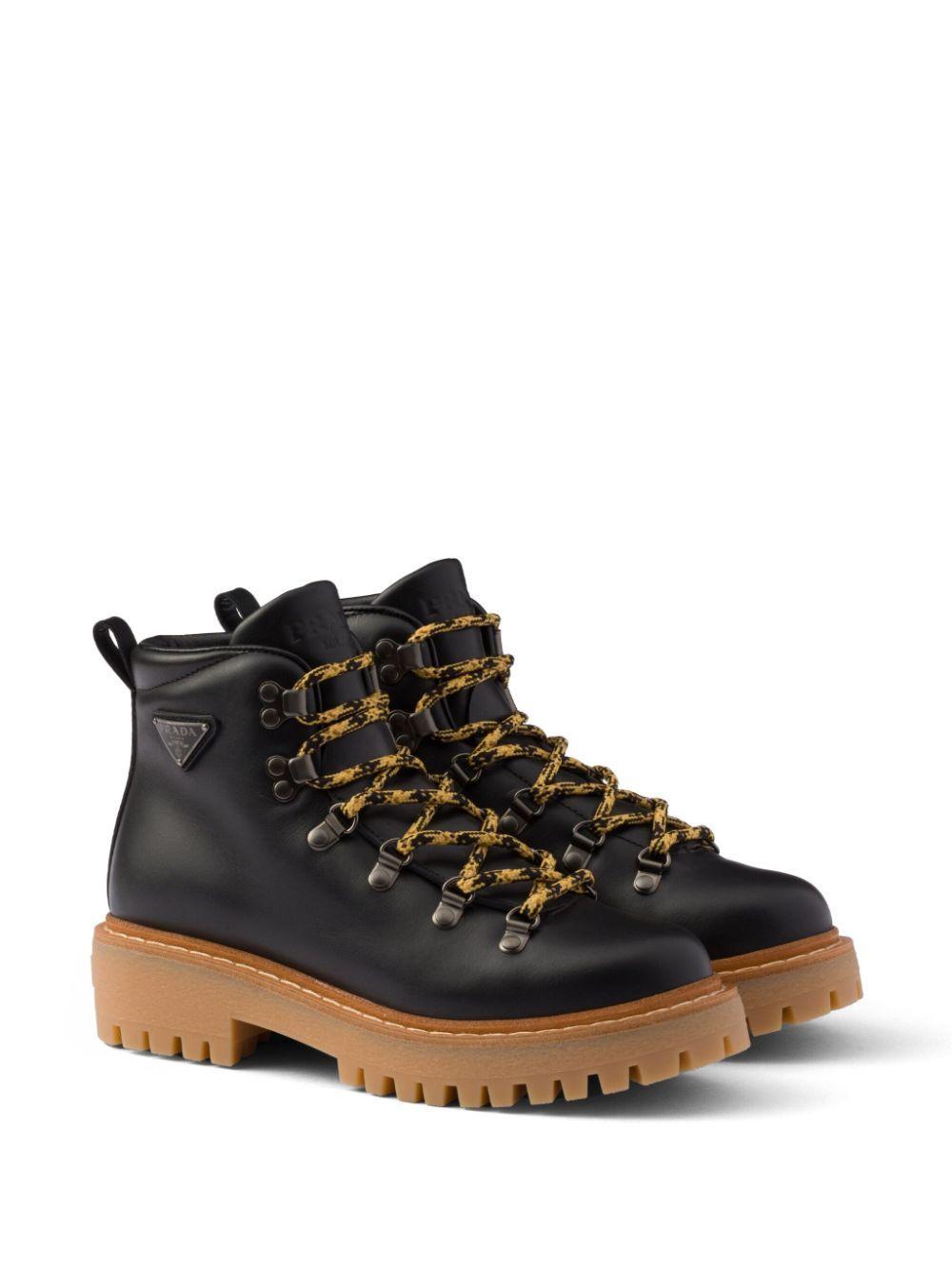 PRADA Laced Leather Ankle Boots In Black Product Image