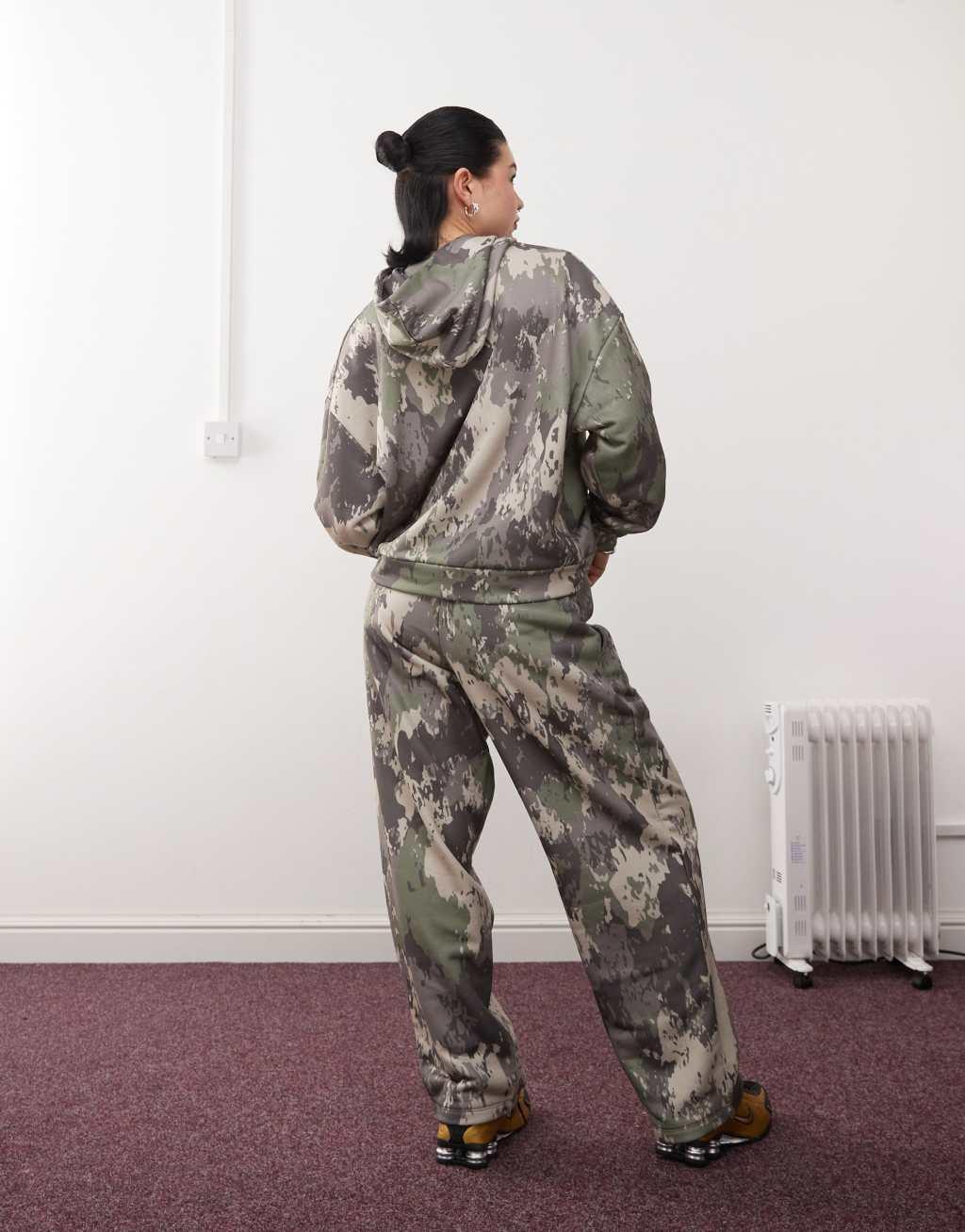 COLLUSION relaxed sweatpants in green camo Product Image