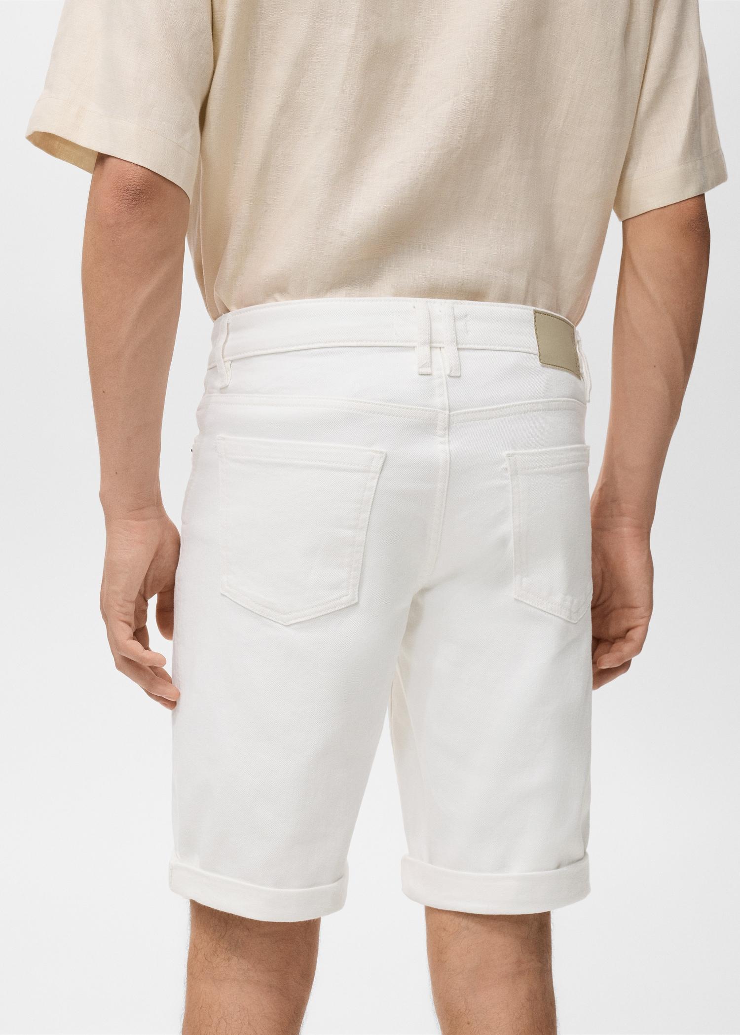 Slim-fit denim bermuda shorts - Men | MANGO USA Product Image