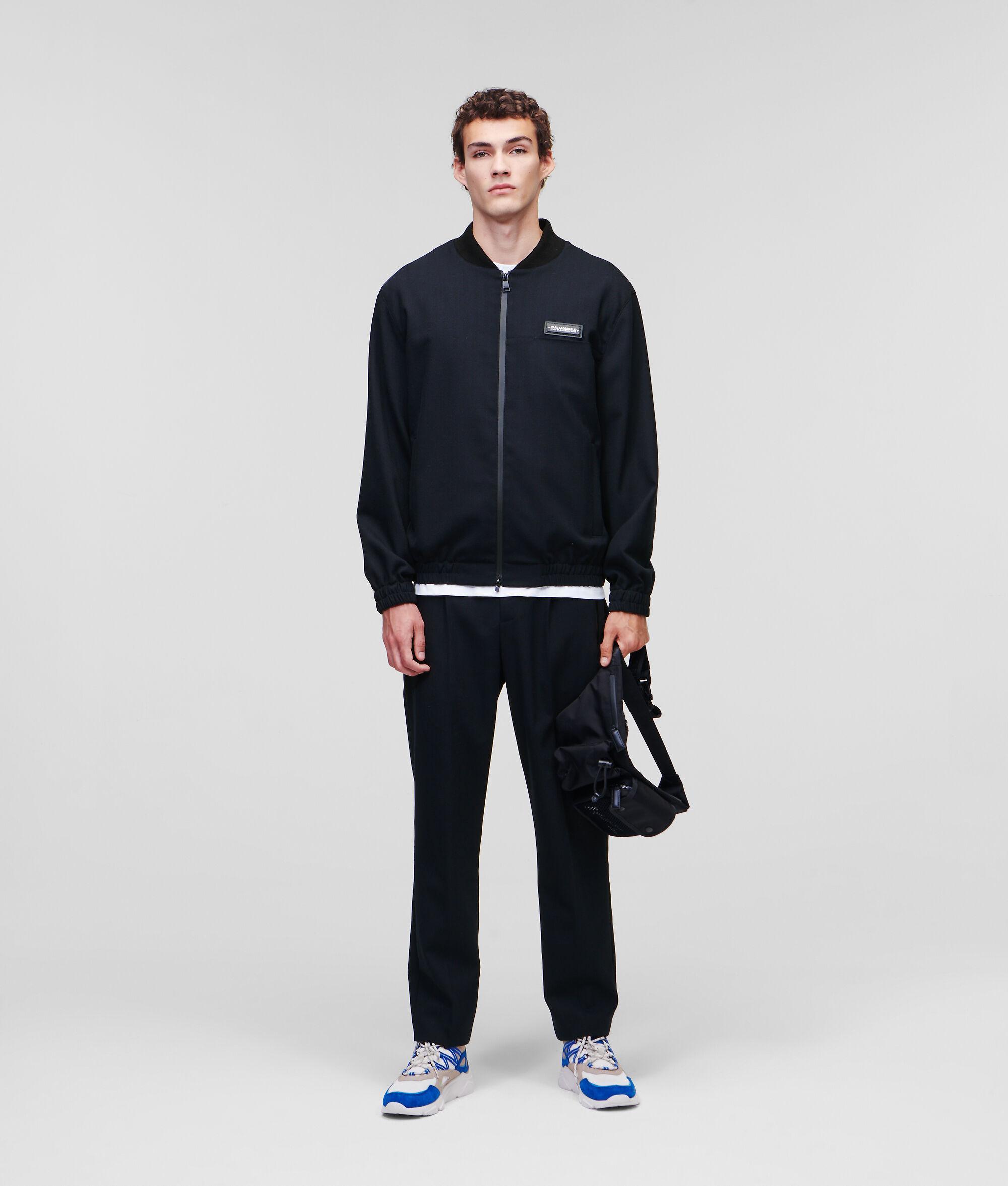 TAILORED PANTS WITH ZIPPED POCKETS Product Image