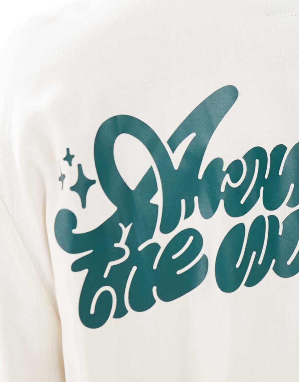 Dr Denim Madi short sleeve relaxed fit summer shirt with world back graphic print in ecru exclusive to ASOS Product Image
