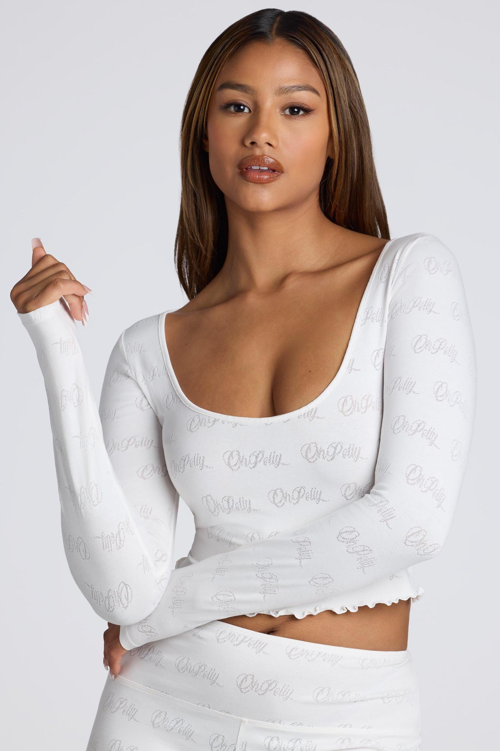 Long Sleeve Scoop Neck Pointelle Crop Top in White Product Image