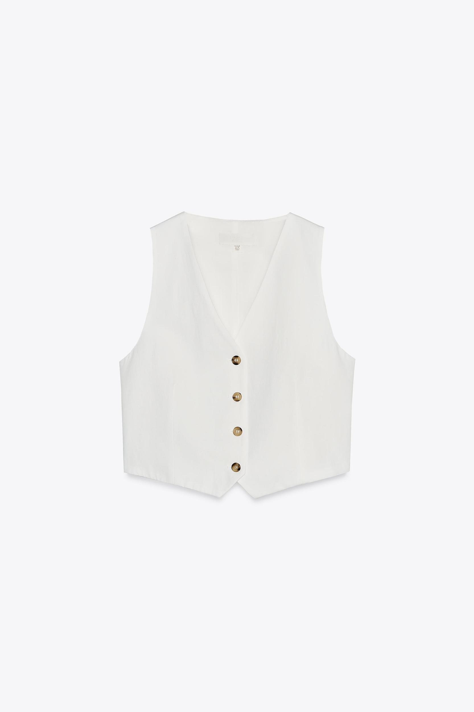 BACK CUT OUT VEST Product Image