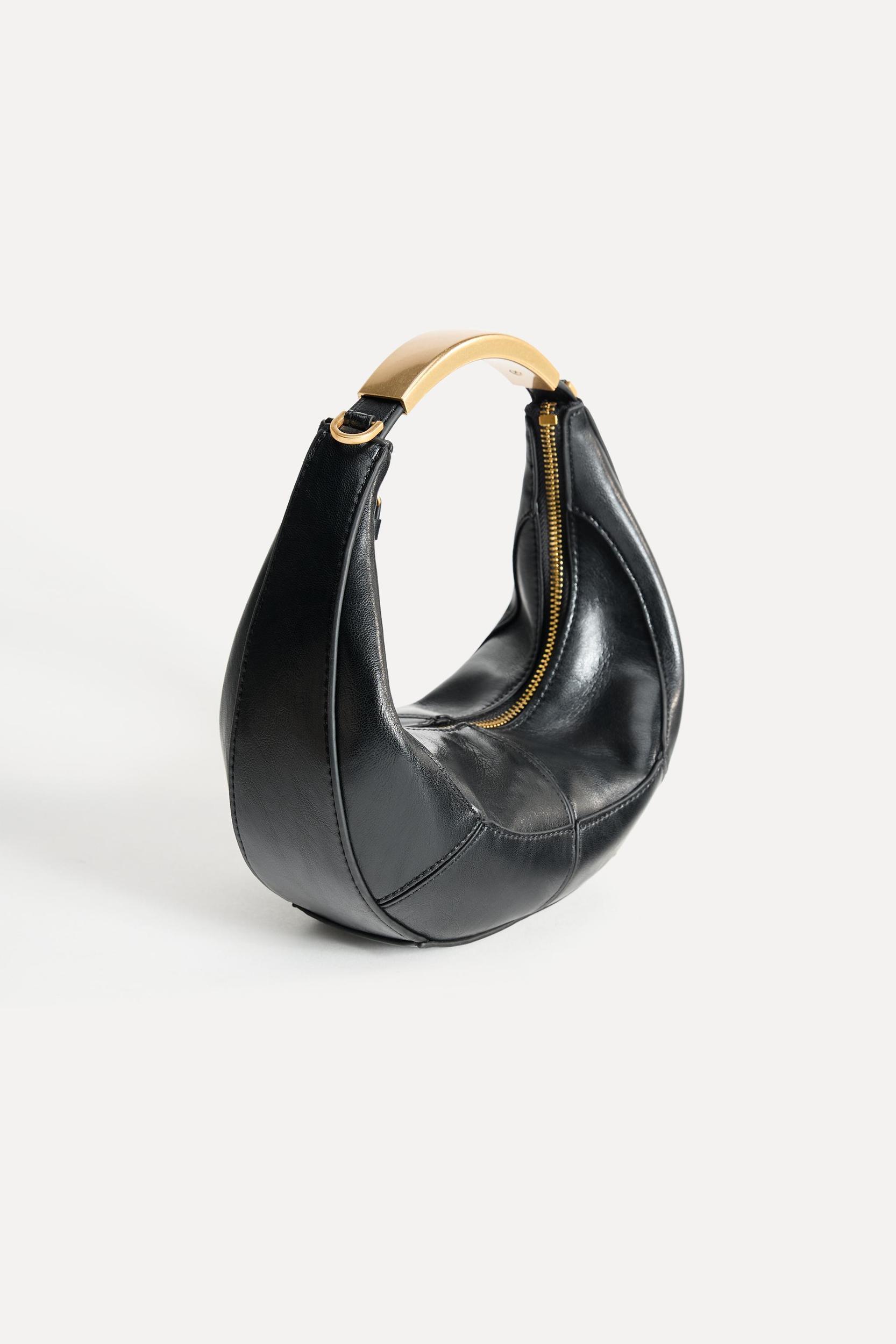 OVAL BAG WITH METAL HANDLE Product Image