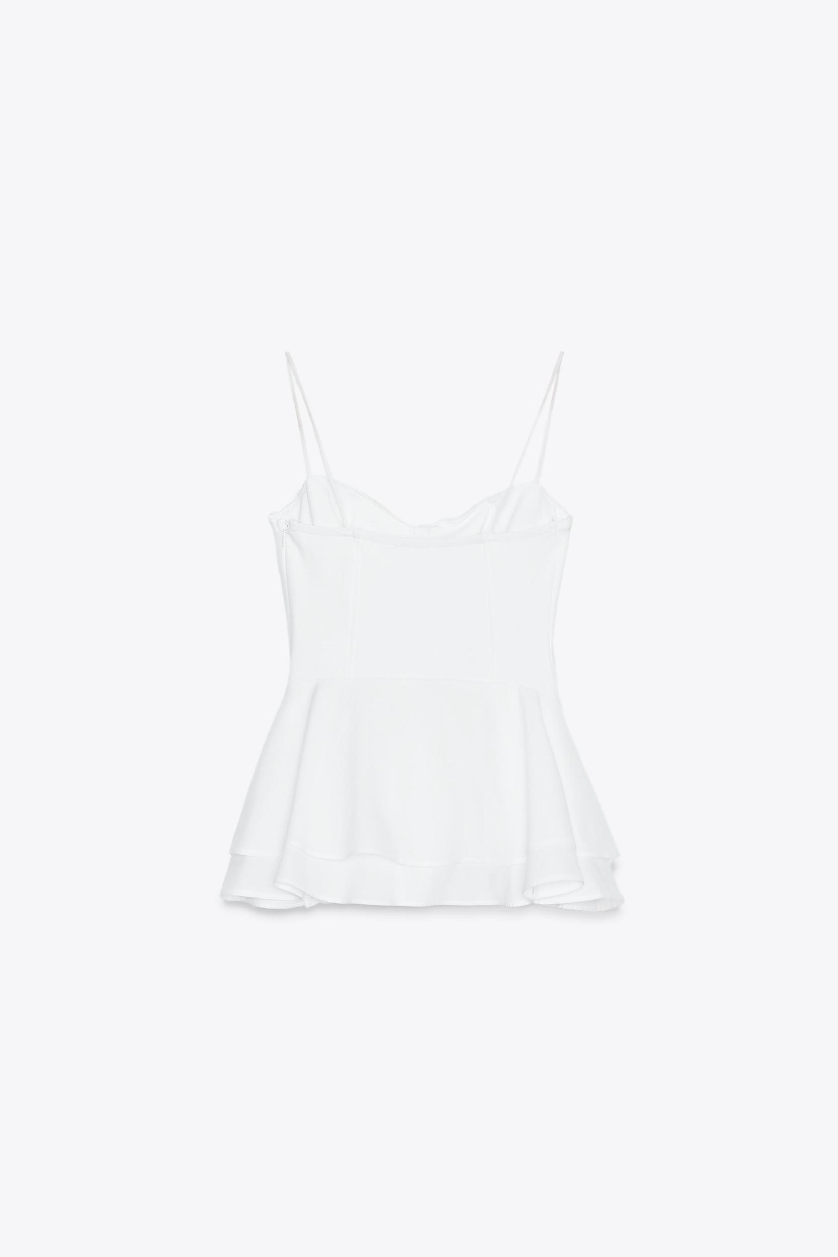PEPLUM MIXED TOP Product Image