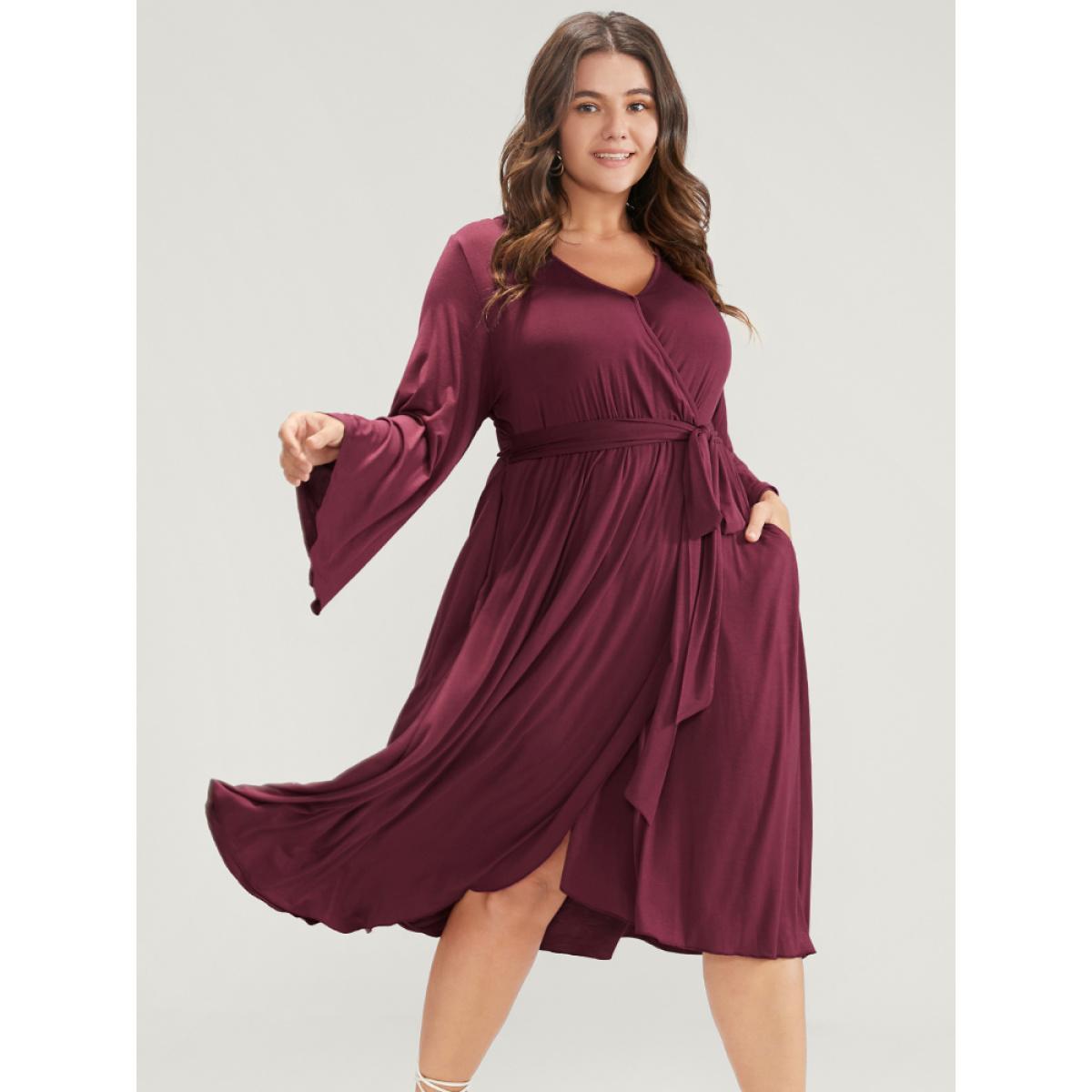 Plus Size Solid Wrap Knotted Front Pocket Bell Sleeve Asymmetrical Hem Dress Burgundy Women Elegant Wrap V-neck Long Sleeve Curvy Midi Dress BloomChic 26/4X Product Image