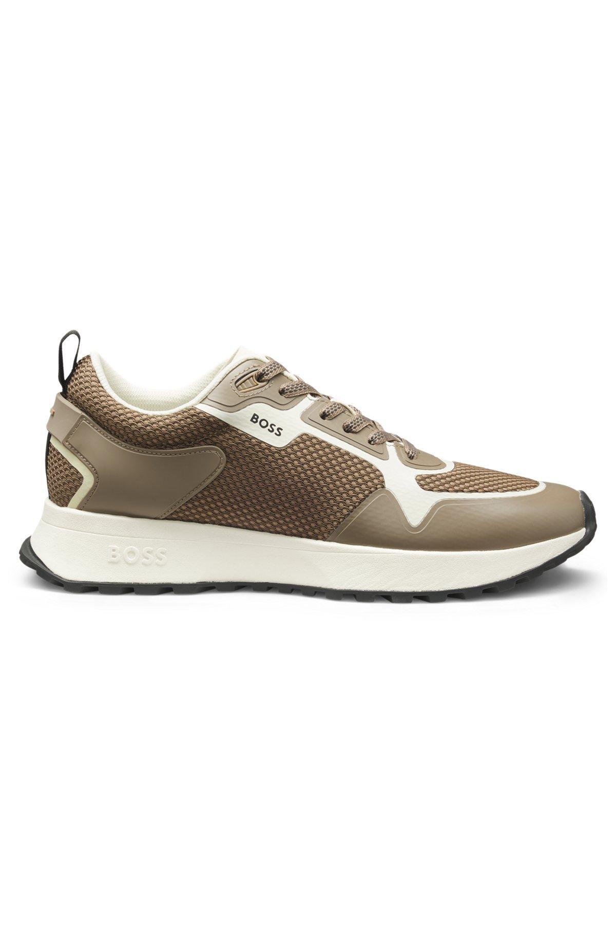 Mixed-material trainers with mesh details and branding Product Image